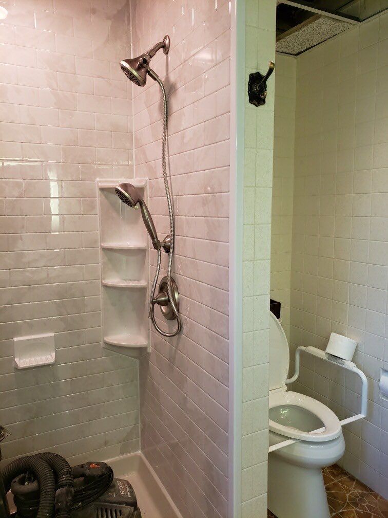 Shower Replacement using BCI Acrylic Shower System by Secure Construction Company Inc