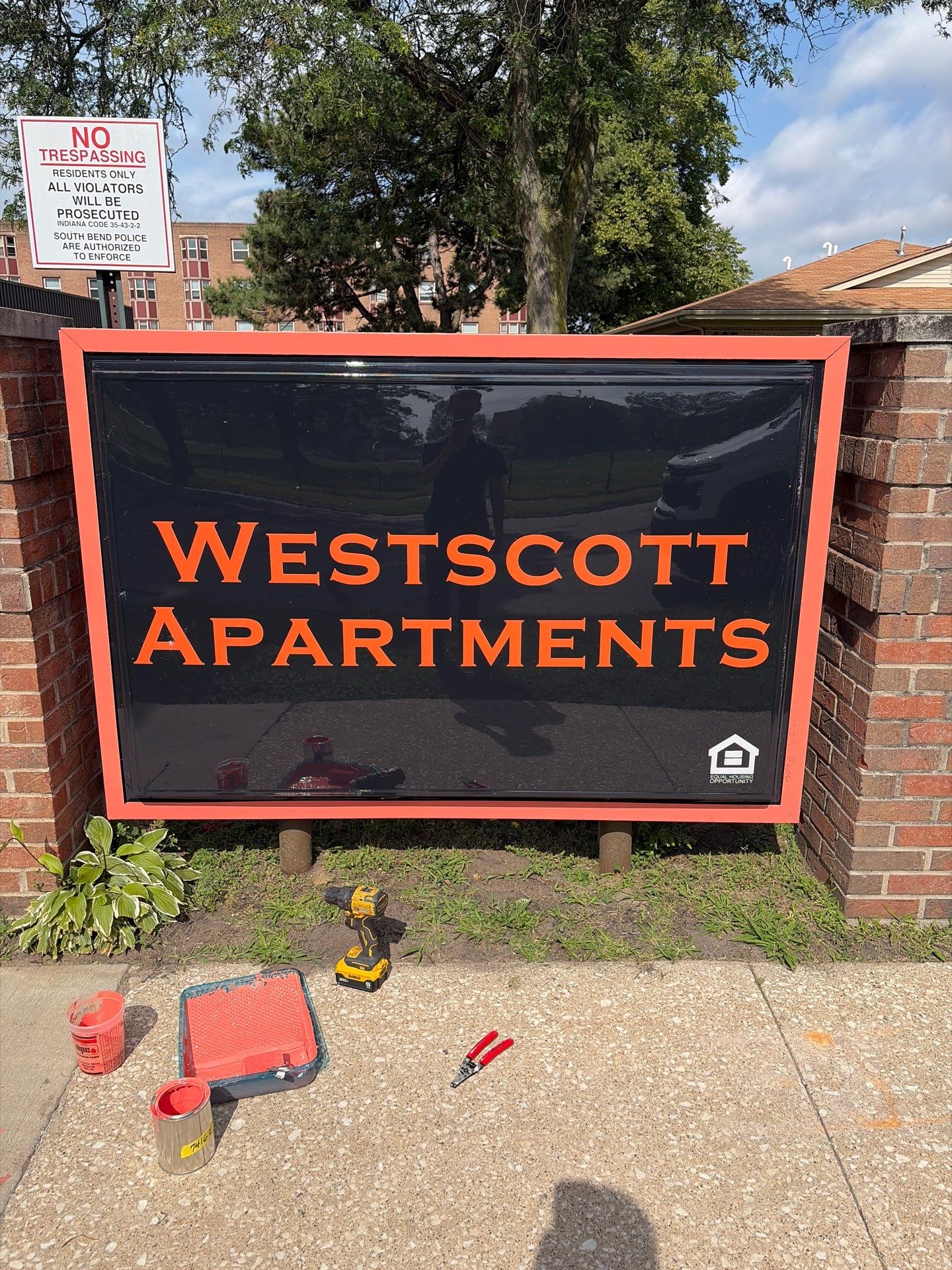 Modern Monument Signage Installation for Westcott Apartments in South Bend by Hayes Design co