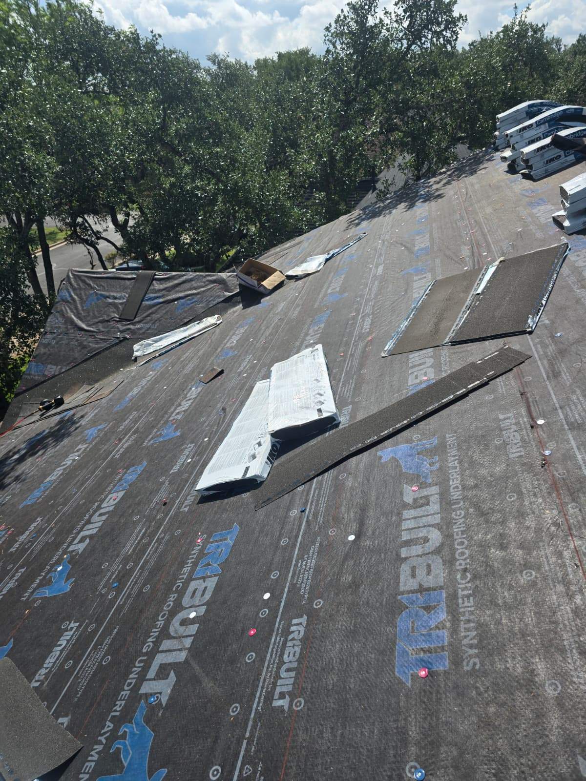 Residential Roofing Replacement and Chimney Flashing Repair in Austin by Caliber Restoration LLC