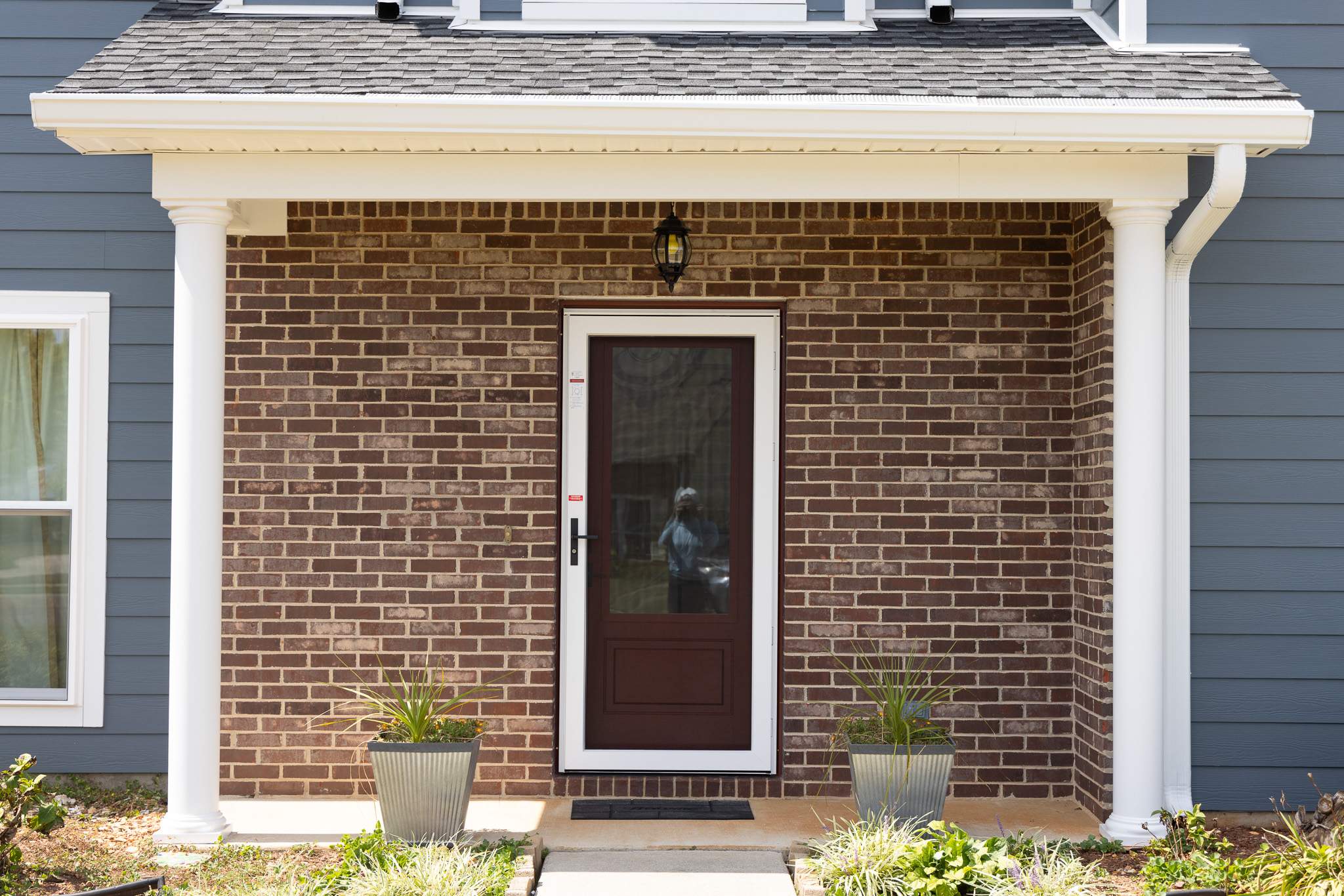 Evening Blue Hardie + Windows by Freedom Exteriors