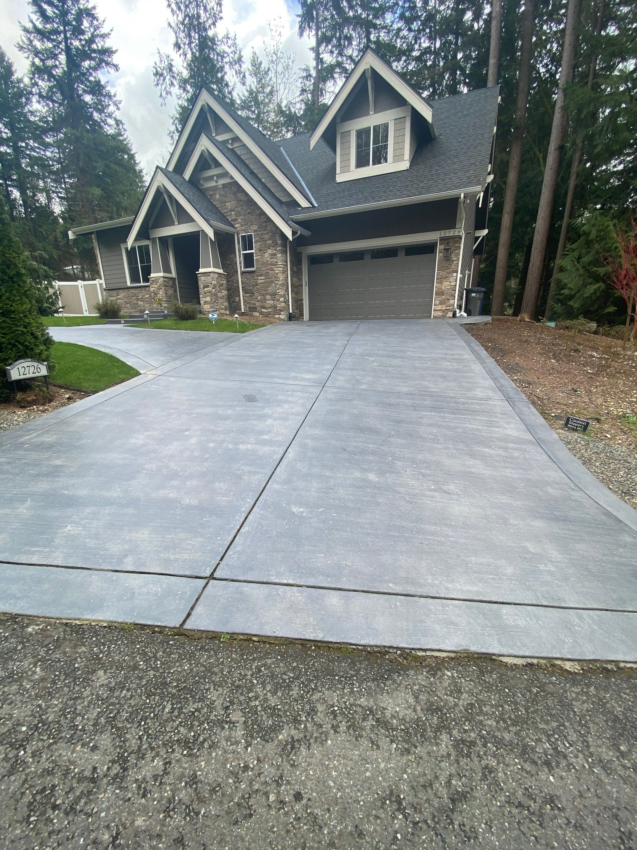 Melanie | Concrete Driveway  by Jireh Asphalt & Concrete Inc 