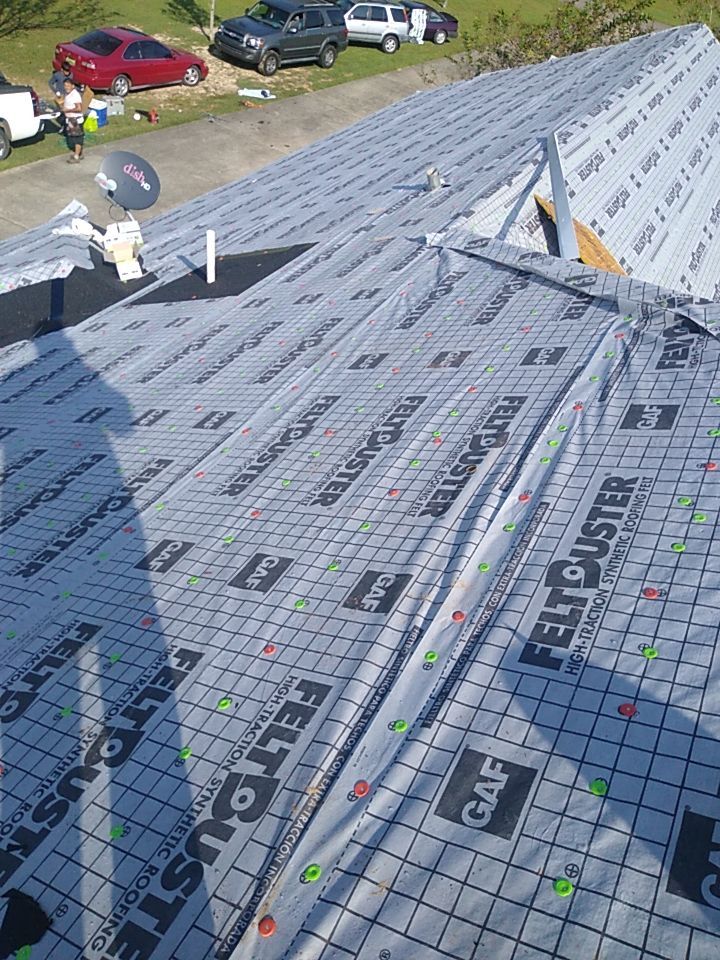 Residential Roofing Installation using Roof Replacement by American Roofing & Construction LLC
