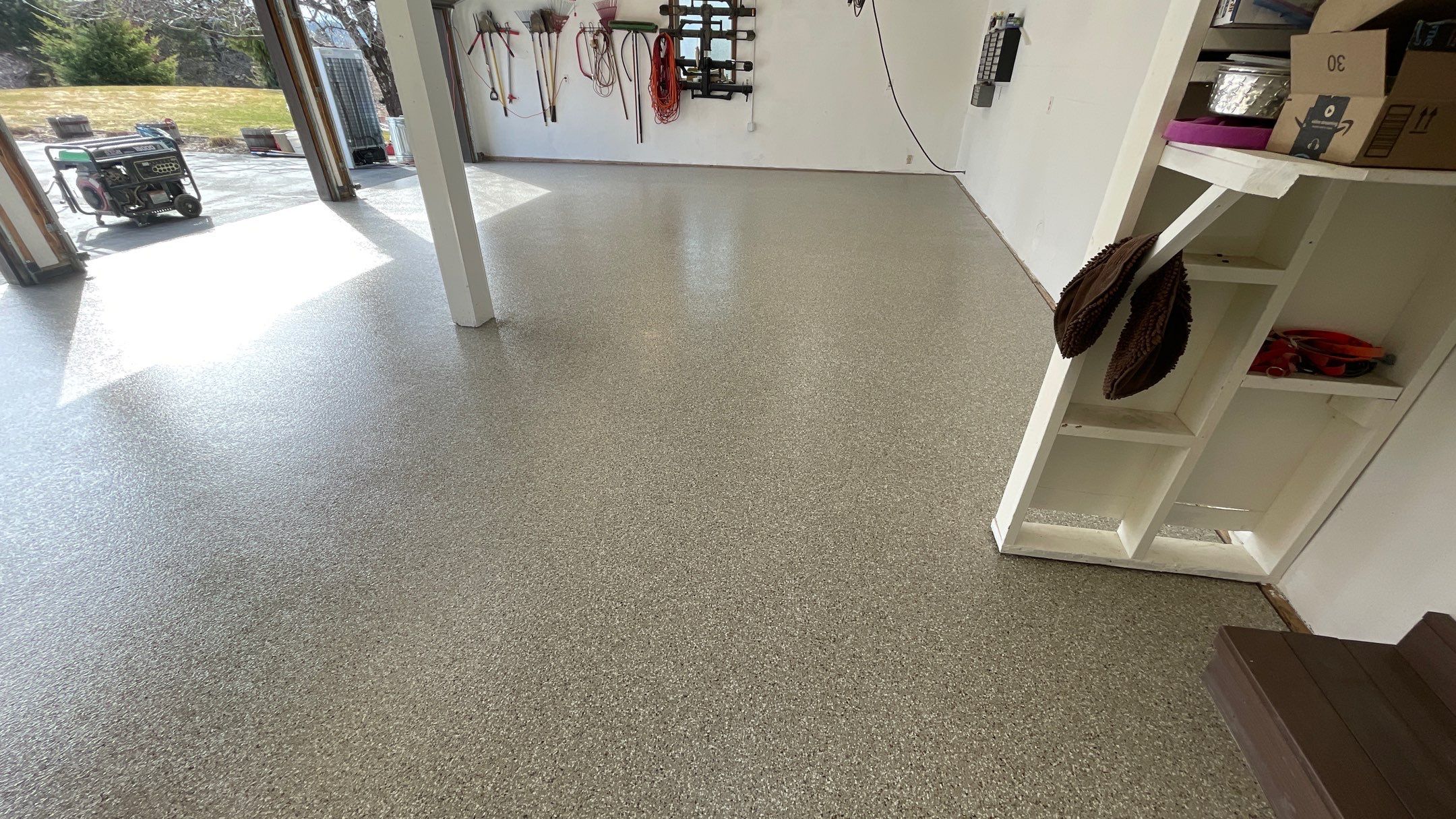 Garage Floor Polyaspartic Coating with Pebble Beach 1/4" Flakes by Croc Coatings, LLC