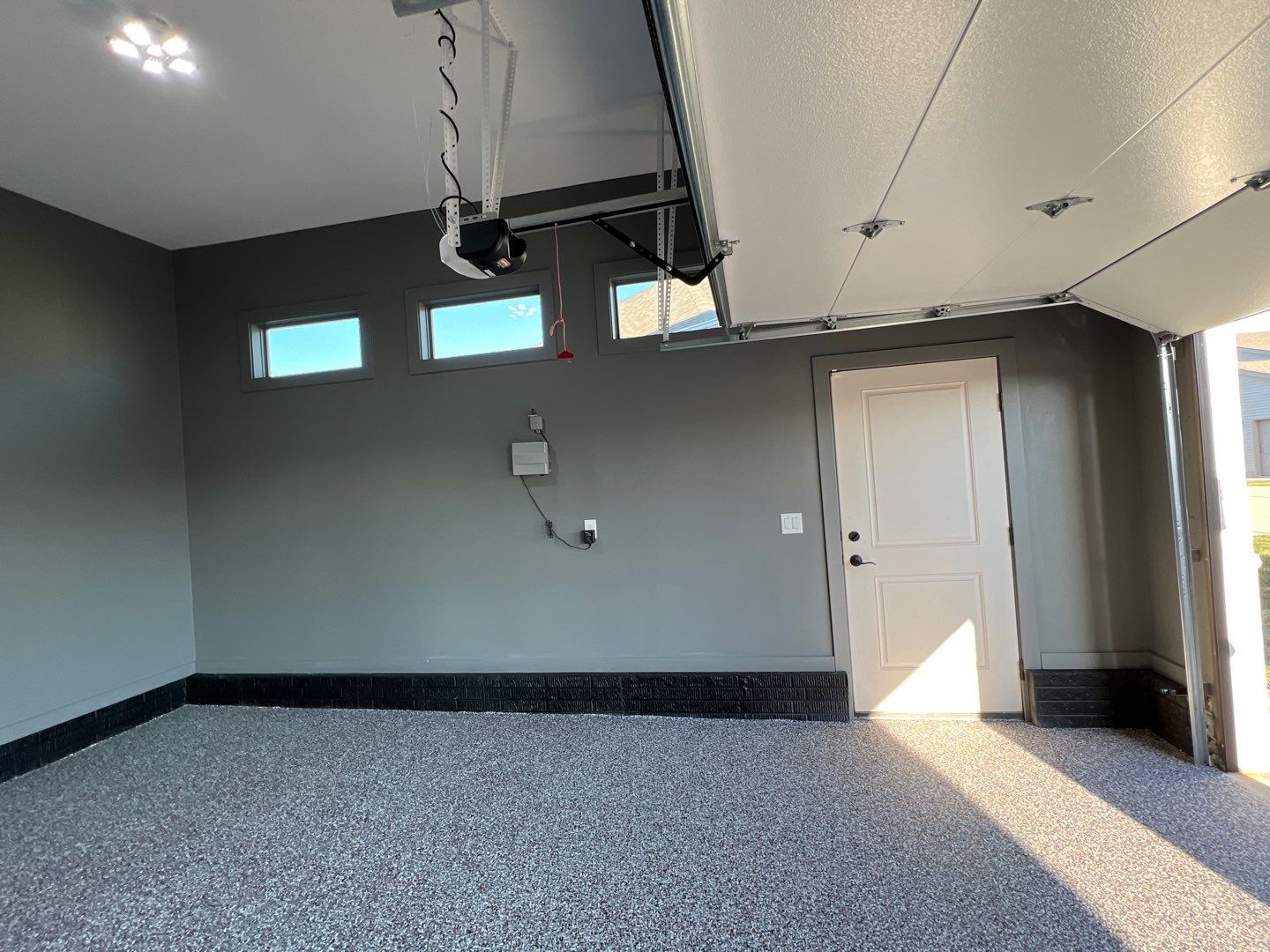 Garage painting and new floor by Cutting edge painting 