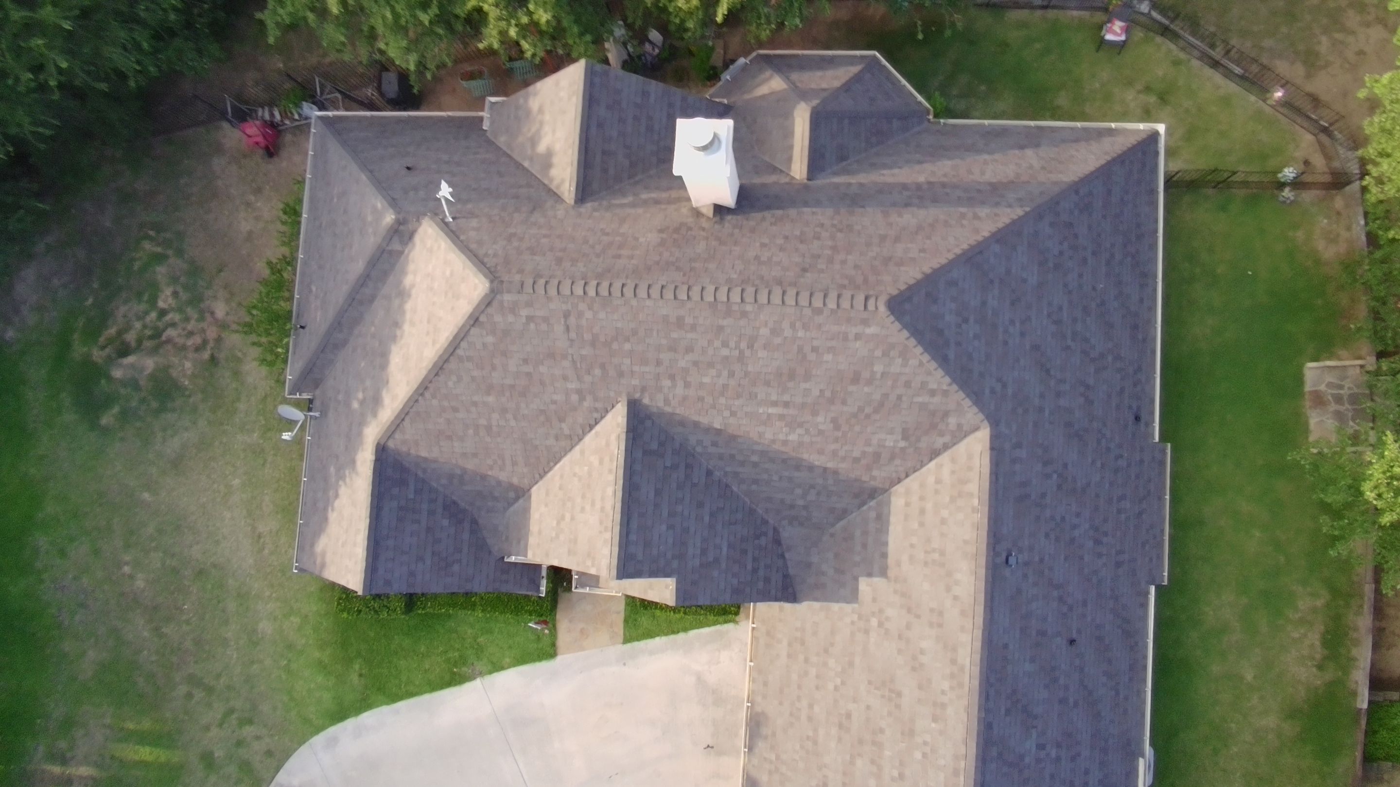 Residential Roof Replacement Using Tamko Titan Shingles in Runaway Bay by Armor Roofing | Exteriors