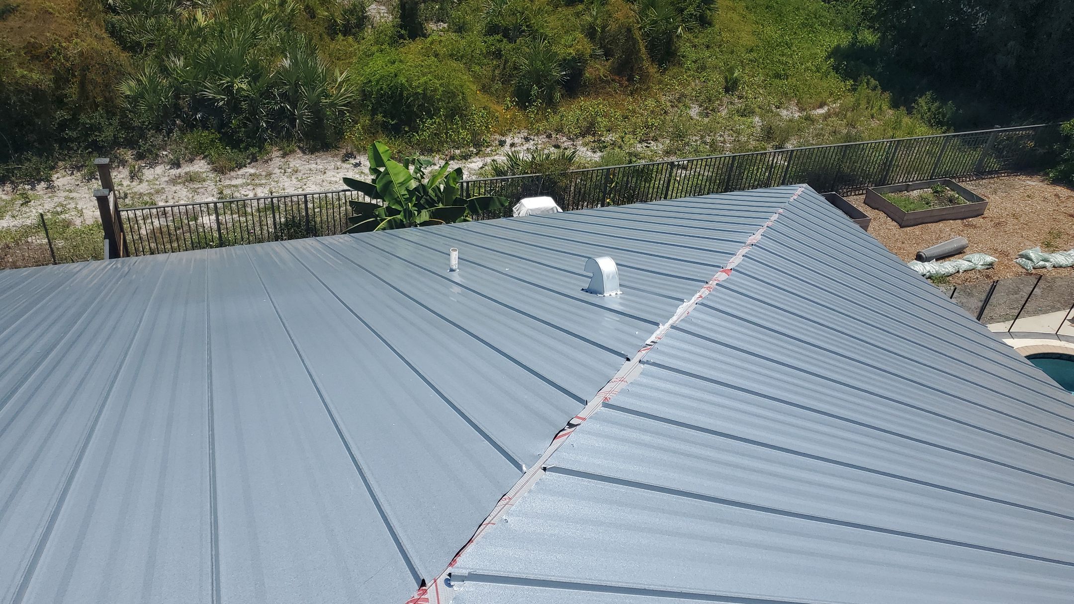 Standing Seam Metal Roof Replacement by Sailfish Roofing