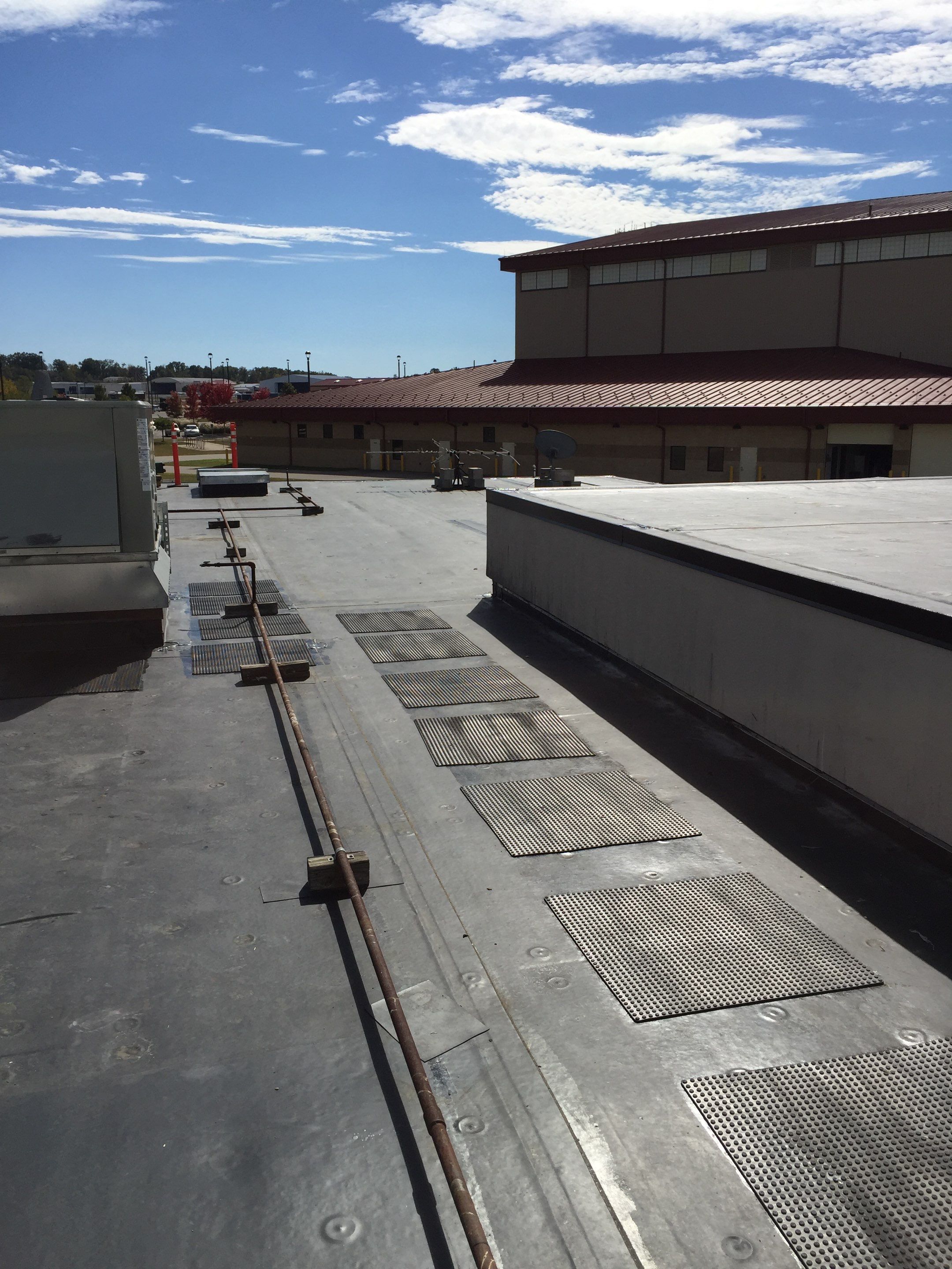 Commercial Rubber Roofing  using Carlisle Rubber Roofing System by Secure Construction Company Inc