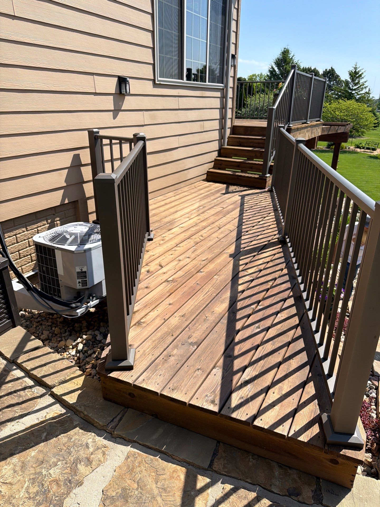 Tiered Wood Deck and Pergola Refinishing in Sioux Falls by Select Painting, Coatings & Garage Cabinets