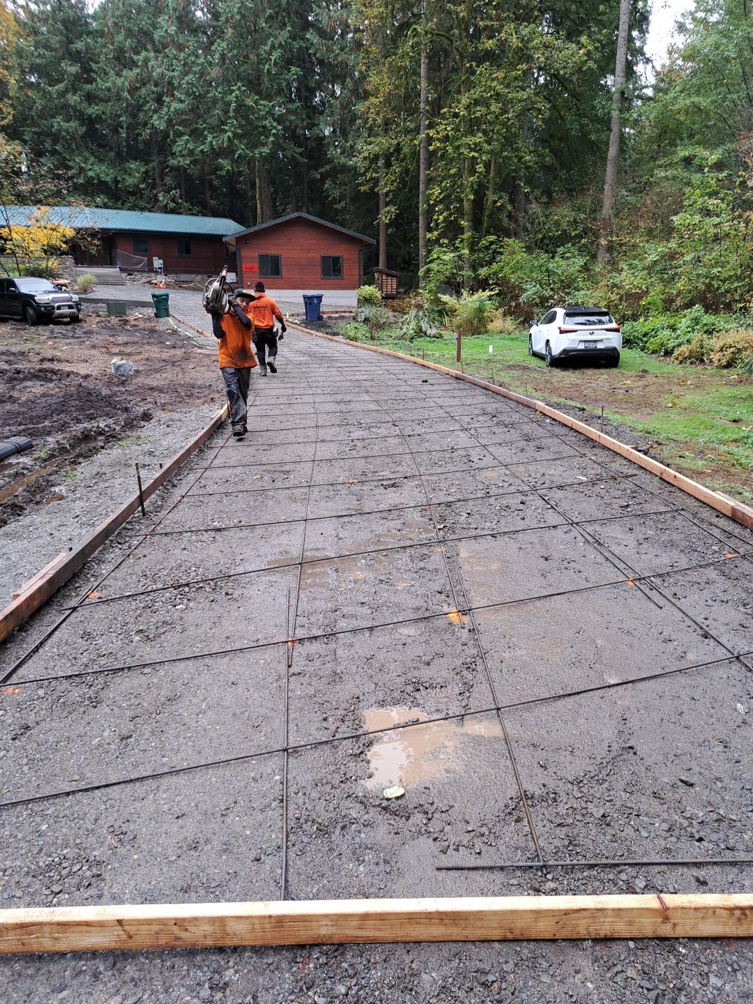 Pia | Custom Concrete Driveway, Walkway & Floating Steps by Jireh Asphalt & Concrete Inc 