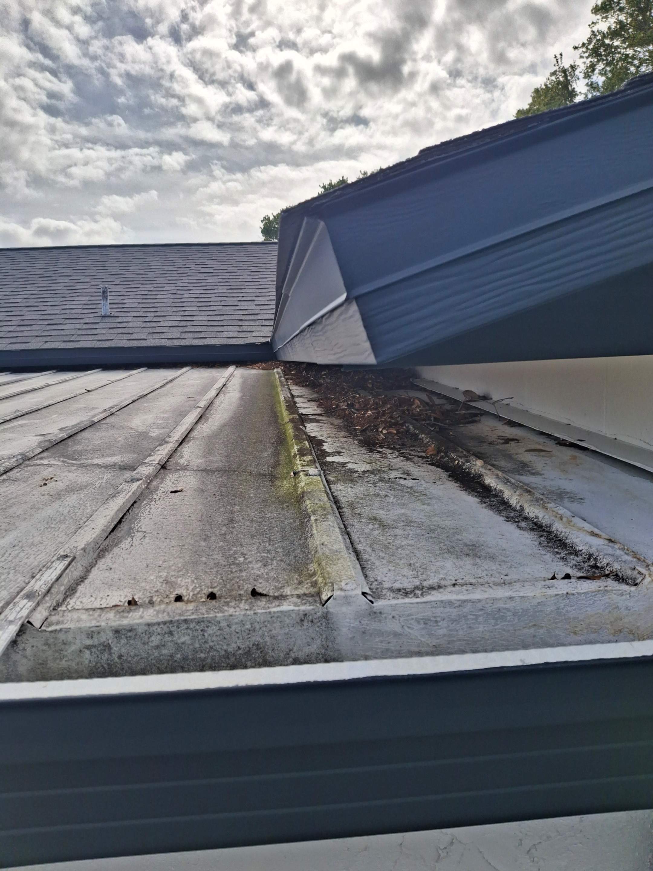 Aluminum Roof Sealing and Protective Liquid Coating in Melbourne by Florida Roofing and Renovations Inc.
