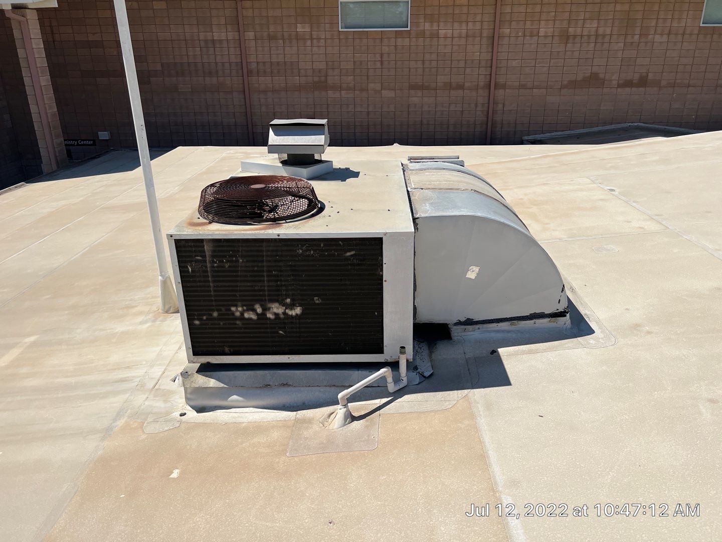 MR Roofing system using Benchmark/PUMA XL coatings over TPO single-ply roofing by Straight Edge Roofing Inc