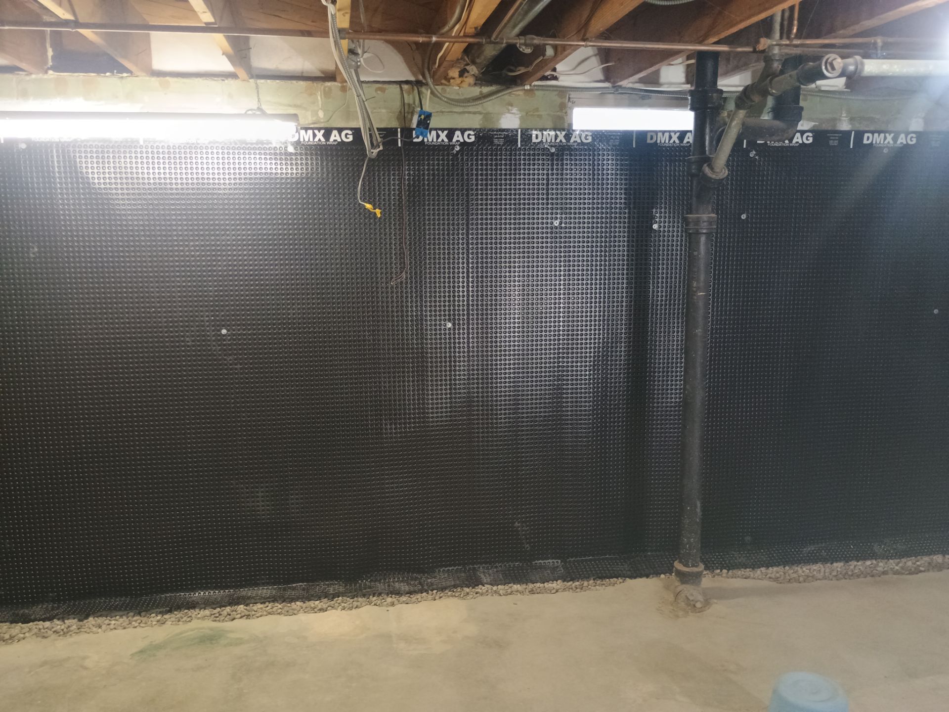 Interior Drain Tile & Wall Drainage in Southwest Minneapolis by Waterproofing Northeast