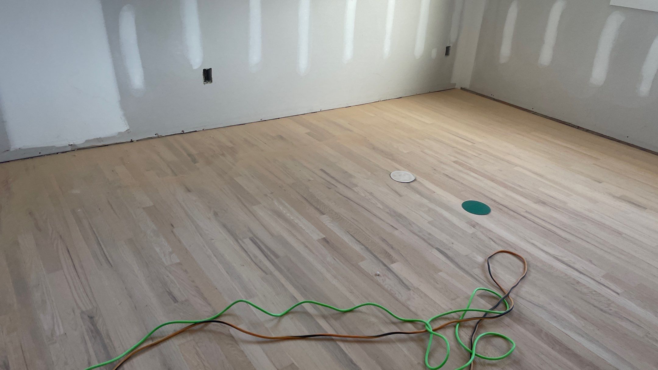 Remodeled Home with new tile floors, Showers and Refinished Oak Floors with stain and Waterbased Finish by Footprints Floors of Coastal Carolina