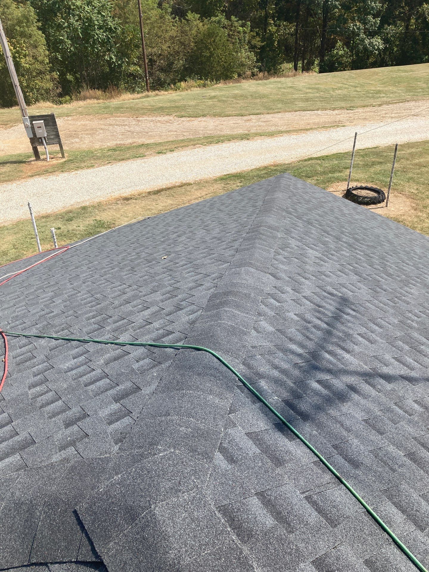Residential Roofing Installation using GAF Timberline HDZ Charcoal by Rainstoppers Roofing