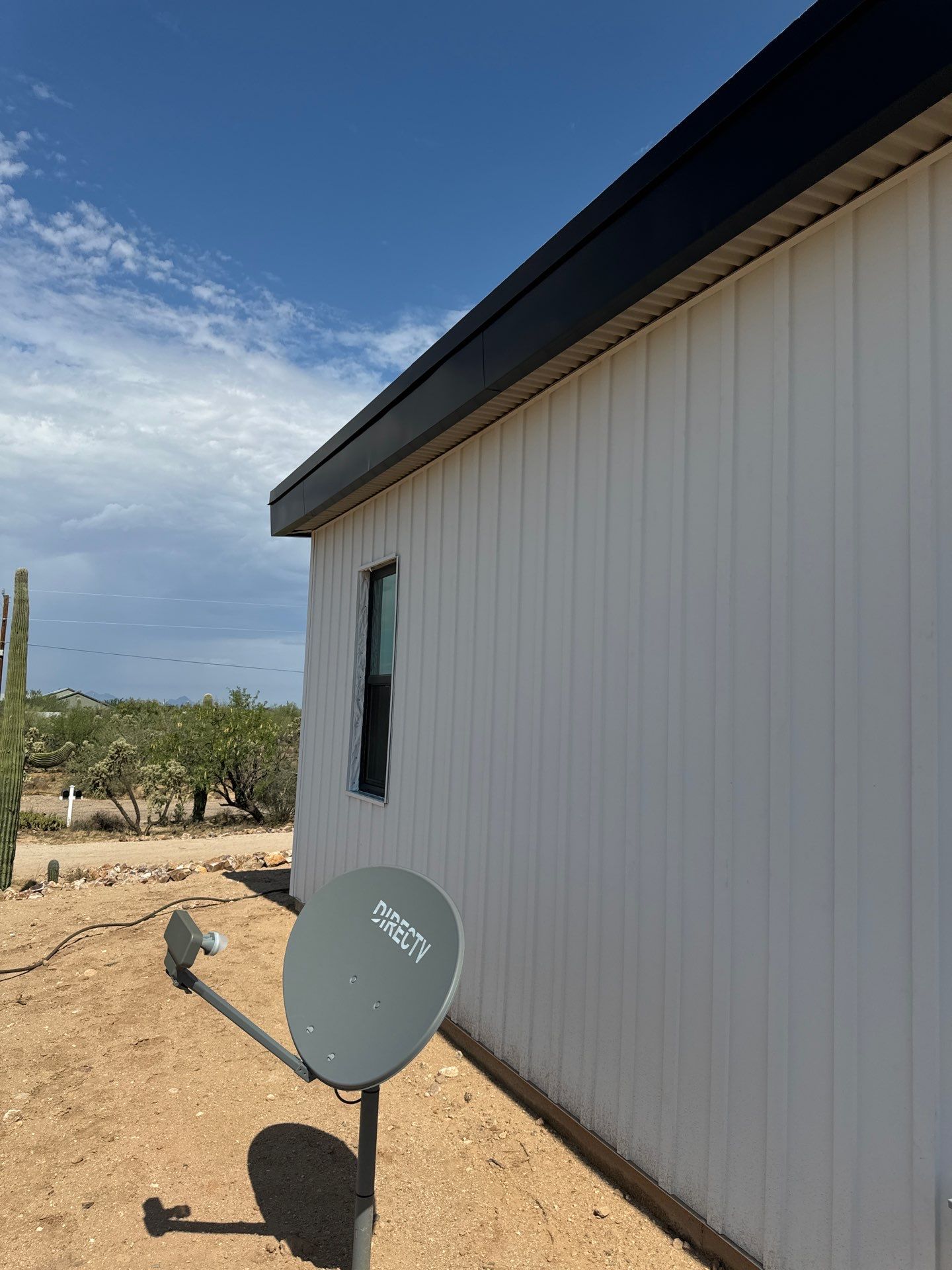 Polar White Metal Siding by Reimagine Roofing