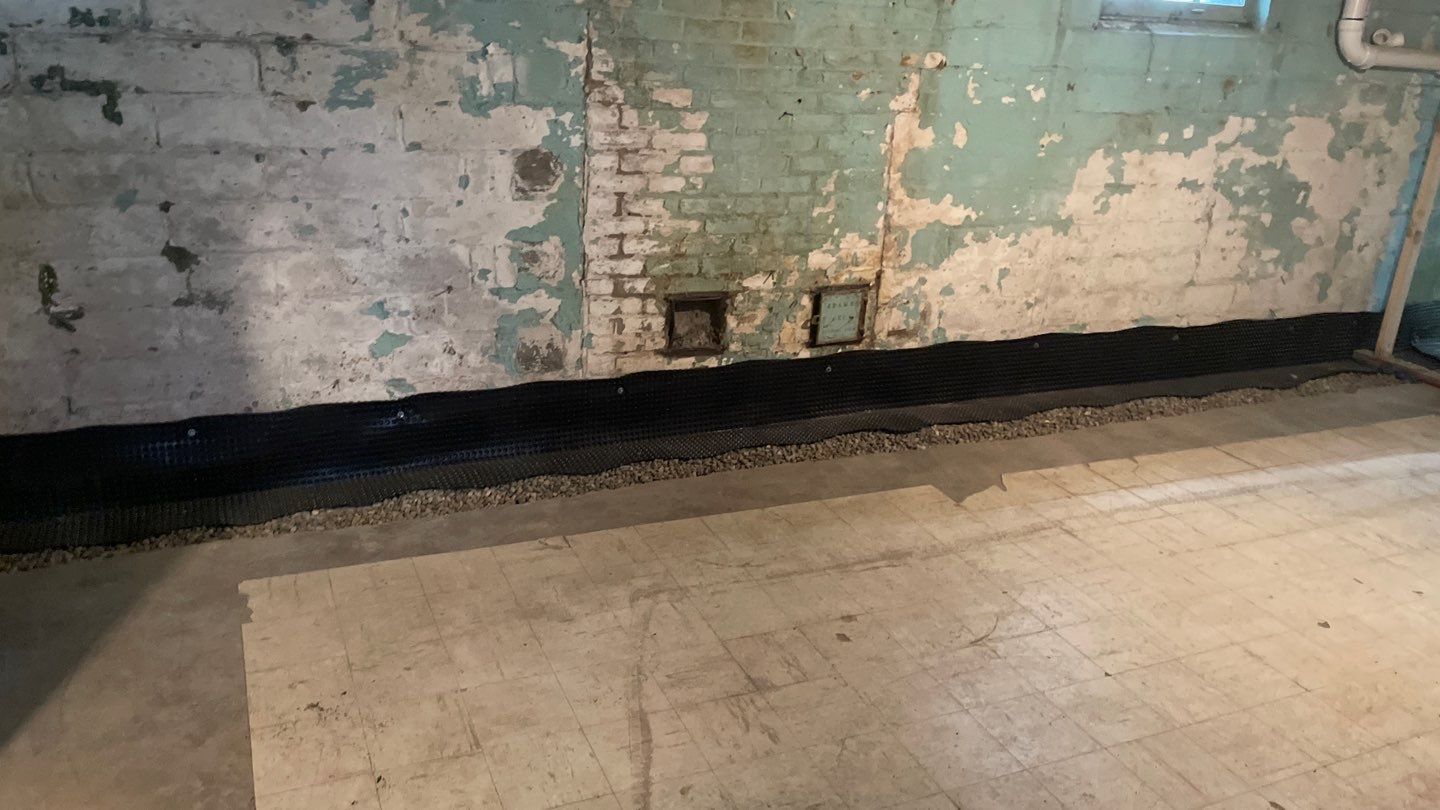 Interior Drain Tile for a South Minneapolis Basement by Waterproofing Northeast
