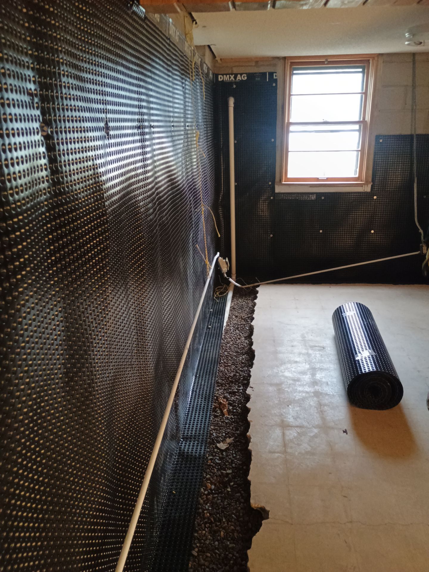 Interior Drain Tile & Foundation Crack Repair in St. Anthony, MN by Waterproofing Northeast