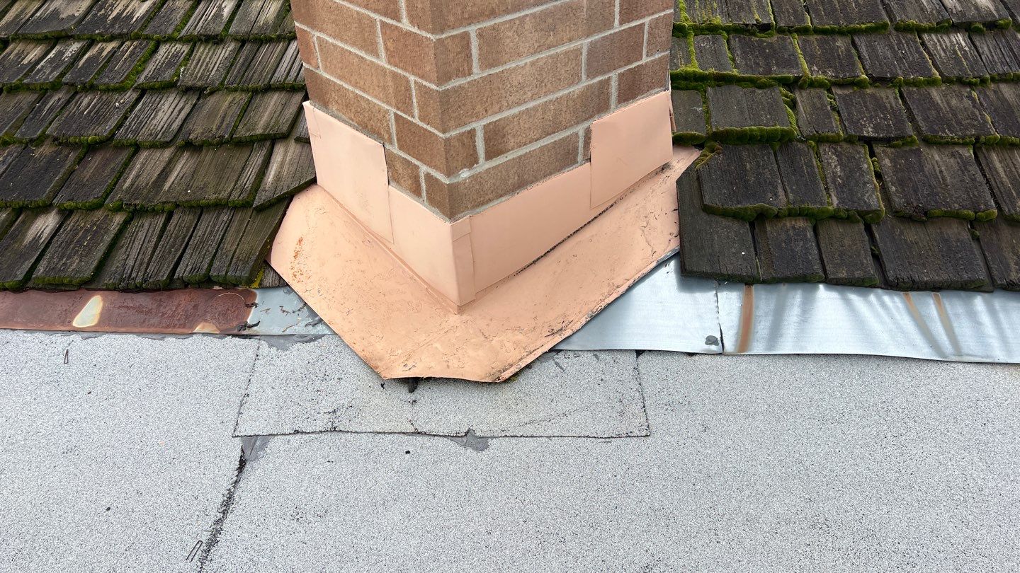 Installation of Certainteed Presidential shingles on residential house by Straight Edge Roofing Inc