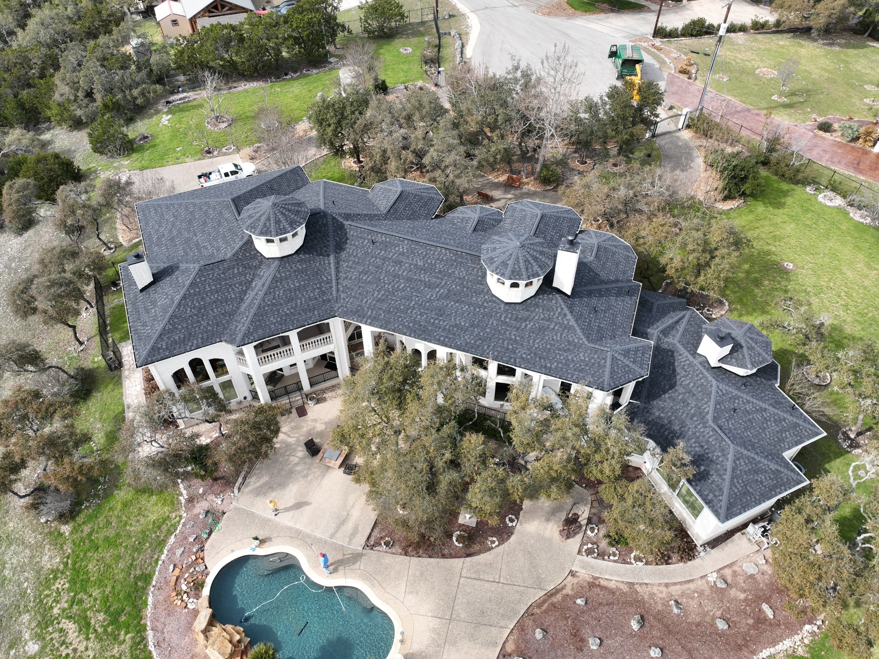 Residential Roof Replacement using 30 Year Laminate Shingles with High Profile Ridge by Premier Roofing and Contracting