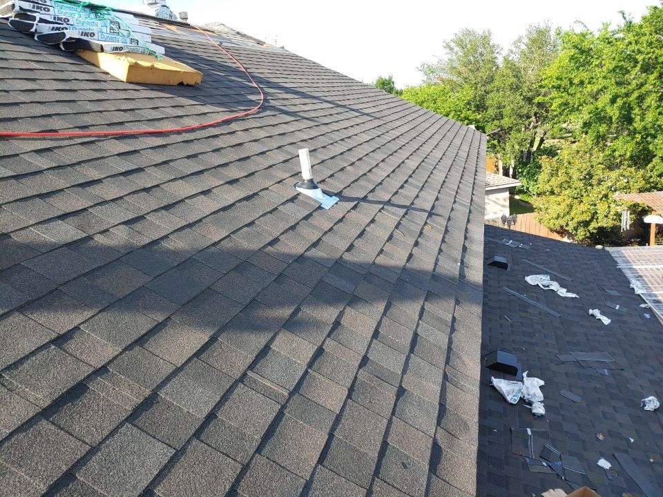 Austin Residential Roof Replacement Featuring IKO Glacier Architectural Shingles by Caliber Restoration LLC