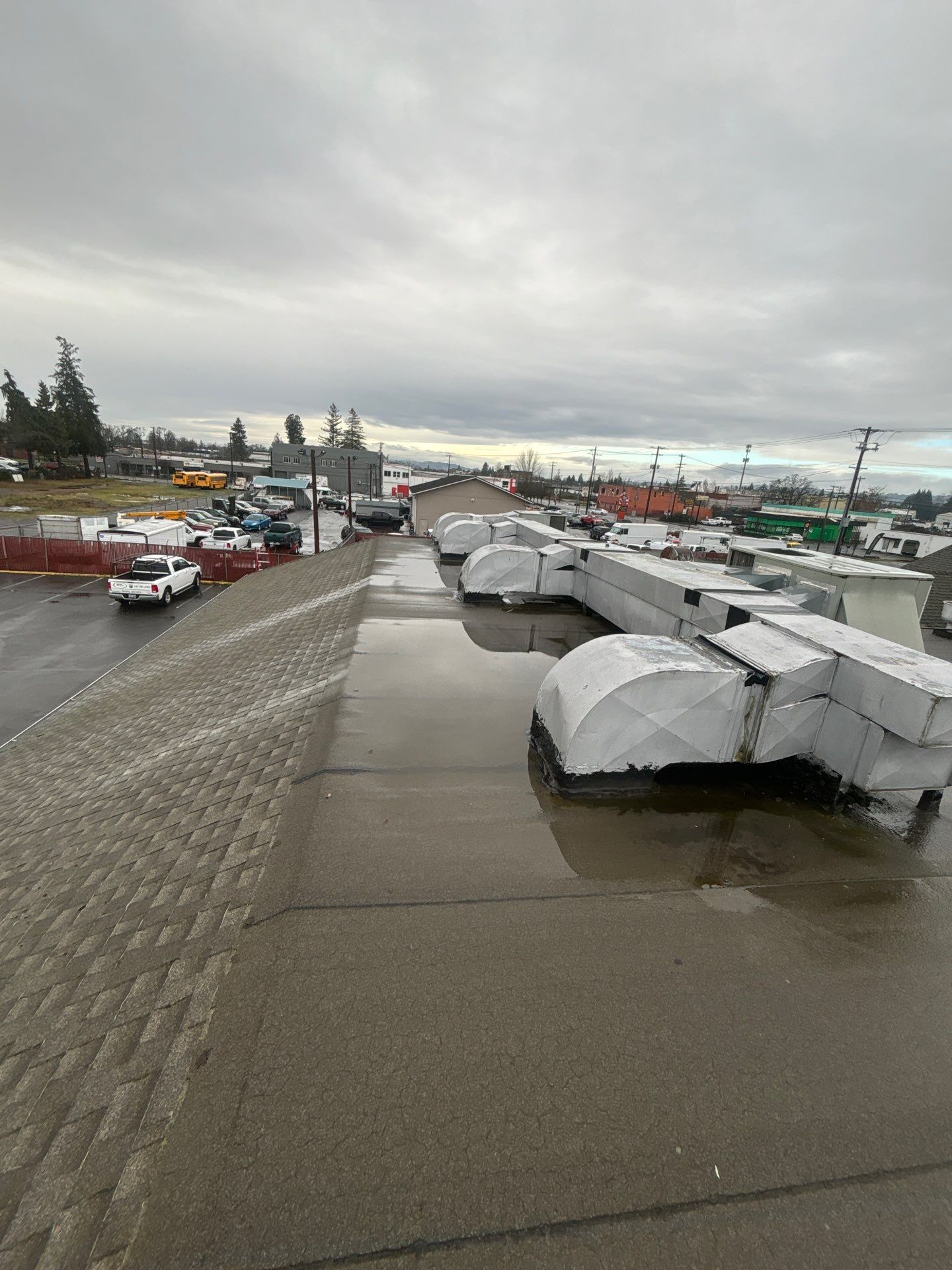 Summit Grey Lum Yun Salem Oregon Commercial Roof by Orezona Building & Roofing Company, Inc.