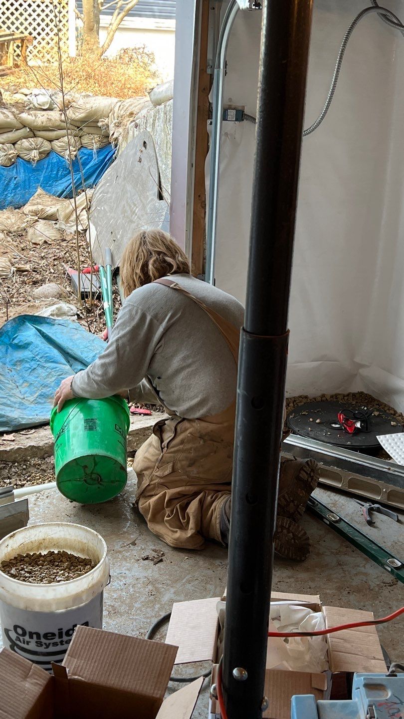 Basement Waterproofing using Drain tile system and a foundation wrap by ACE Waterproofing & Basement Solutions