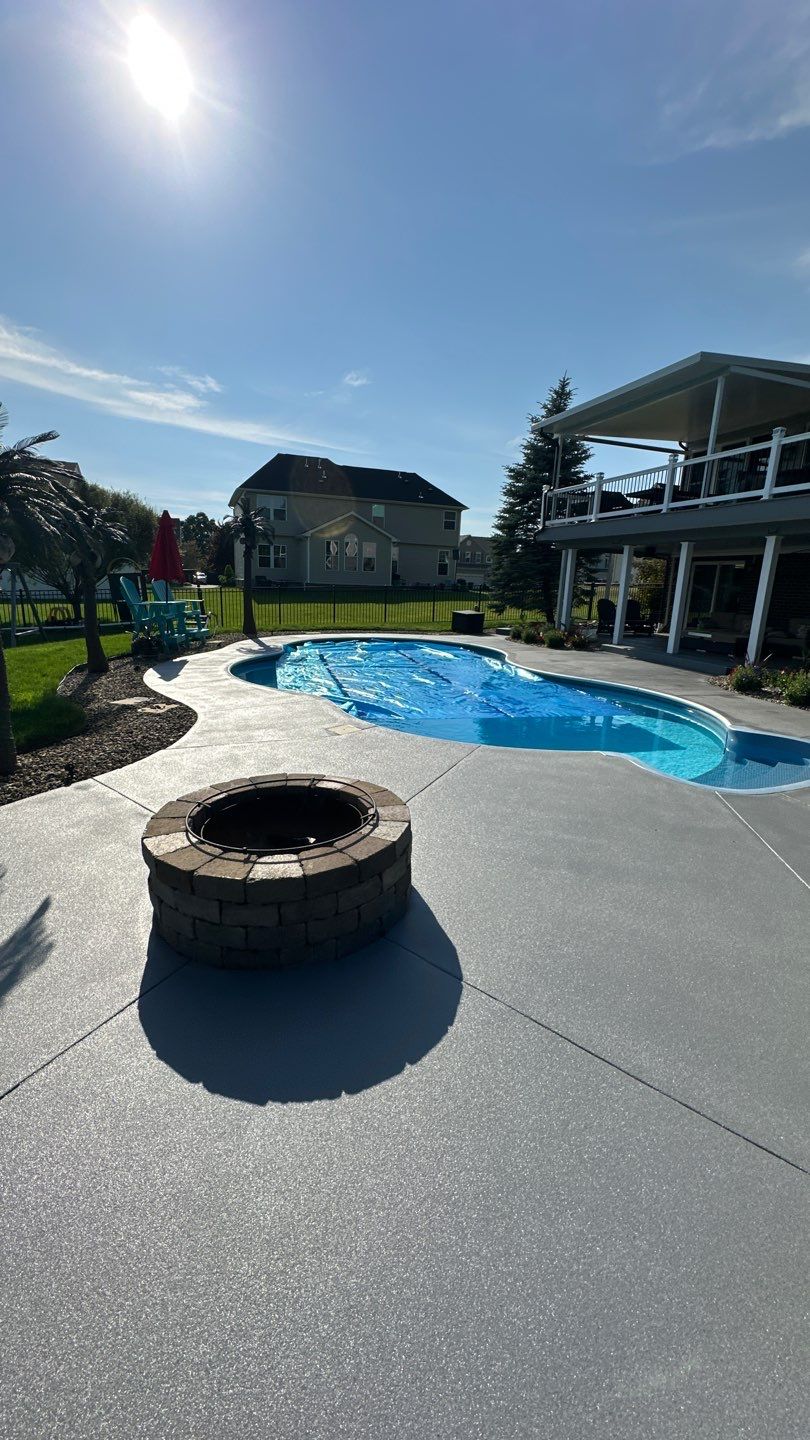 Twilight Pool Deck / Patio Project in Beaver falls by Floors in a Day, Inc