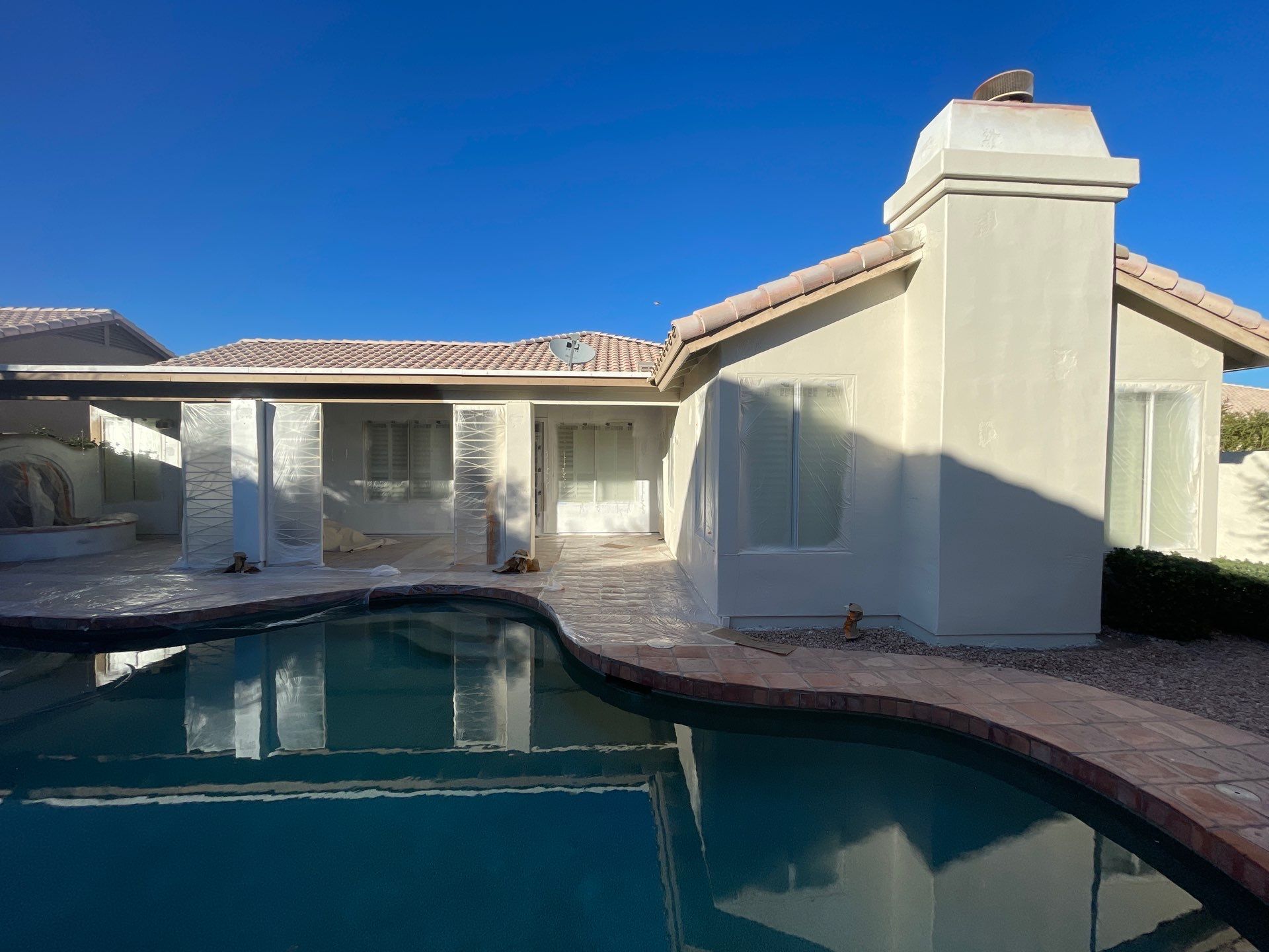 Gazzo - A Beautiful Home Exterior Transformation in Scottsdale, AZ with C&M Primer and Sherwin Williams Paints by Double G Painting Contractors, LLC