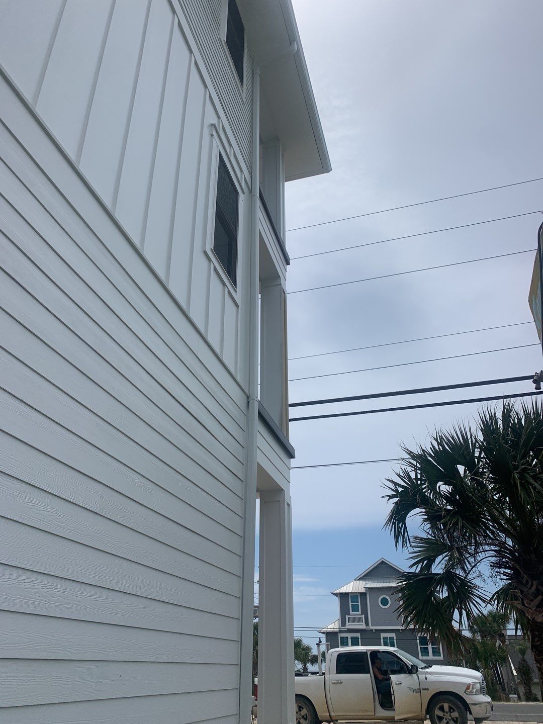 Downspout Installation for Multi-Story Building in Panama City FL by Gutter Professors