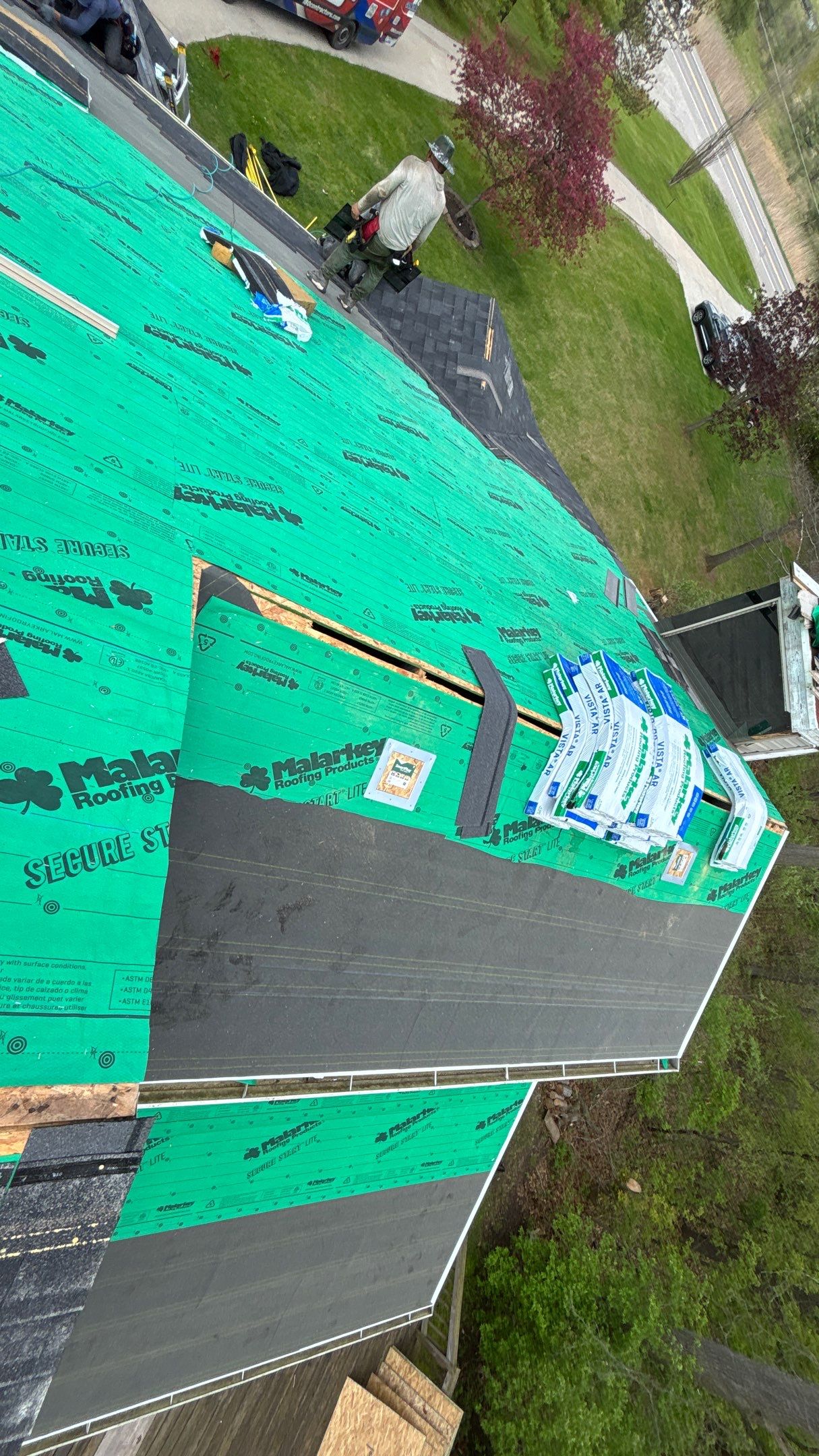 Roof Replacement using Malarkey Vista Brilliant Black by 180 Contractors