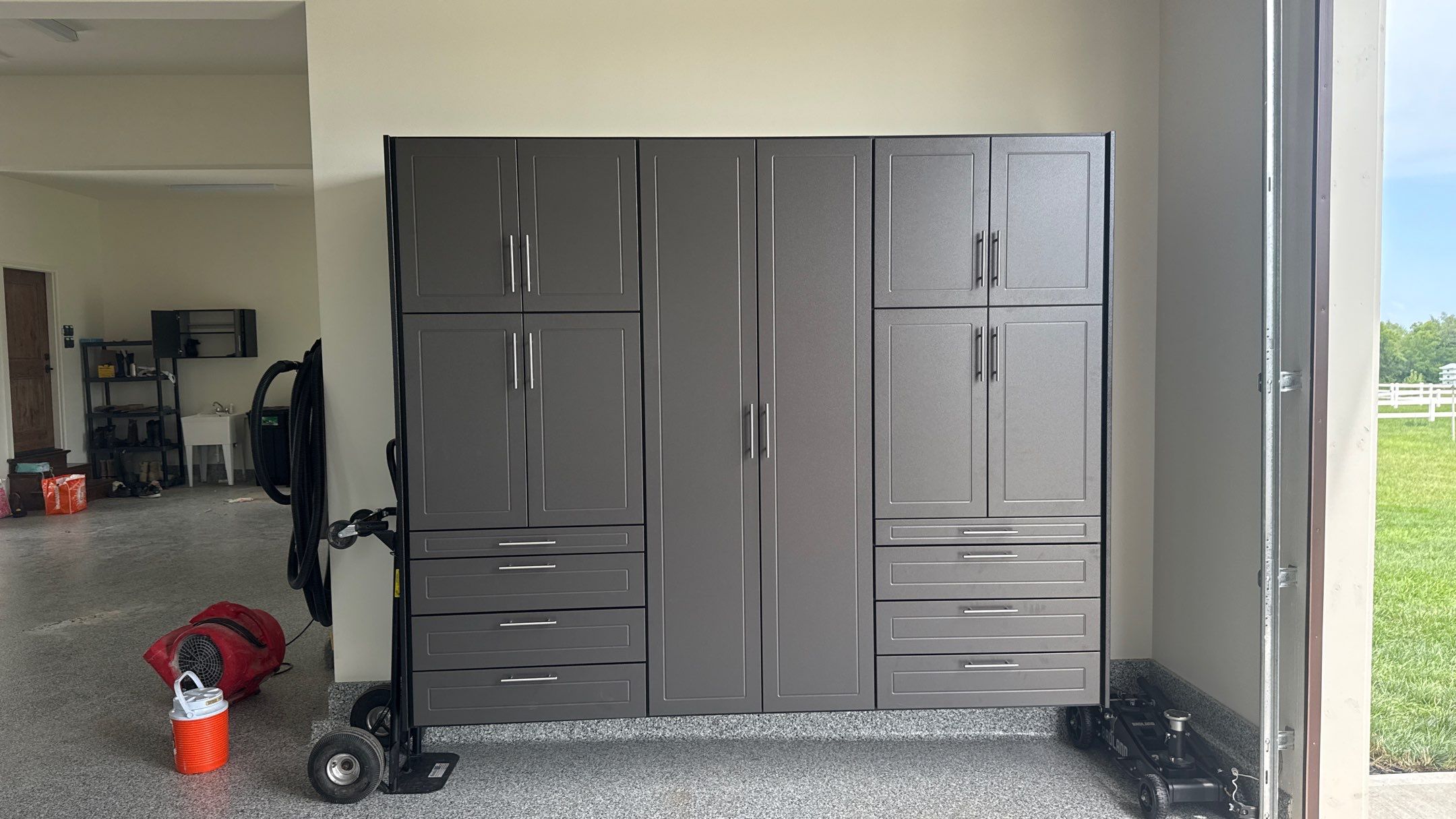 Mark Added Storage Plus A Motorized Lift  by Banner Garage