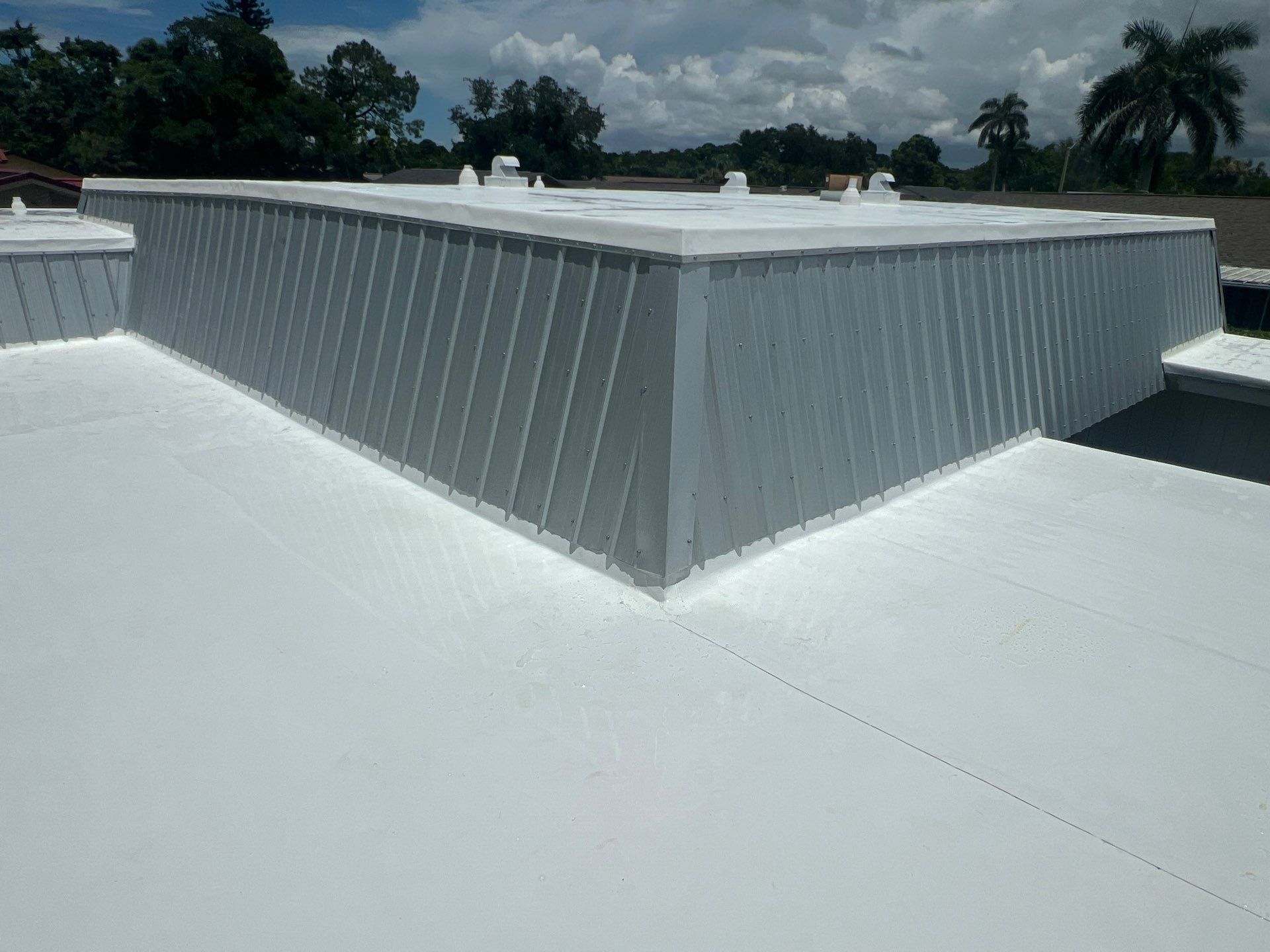 Residential Roofing Installation using TPO Roofing System & Tuff Rib Metal  by Durabilis Roofing INC