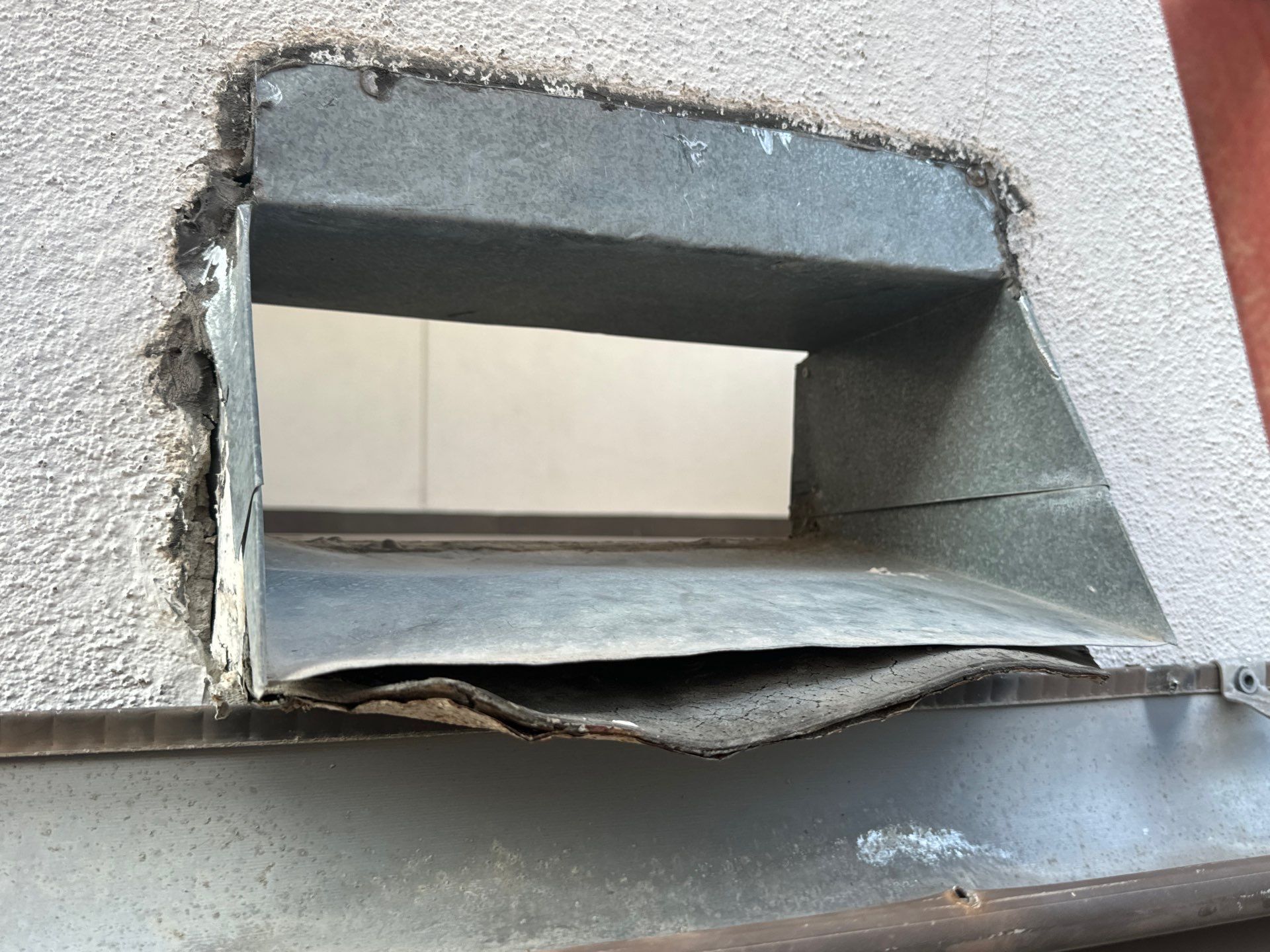 Scupper Repair Wall Leak by Associates Roofing Unlimited 