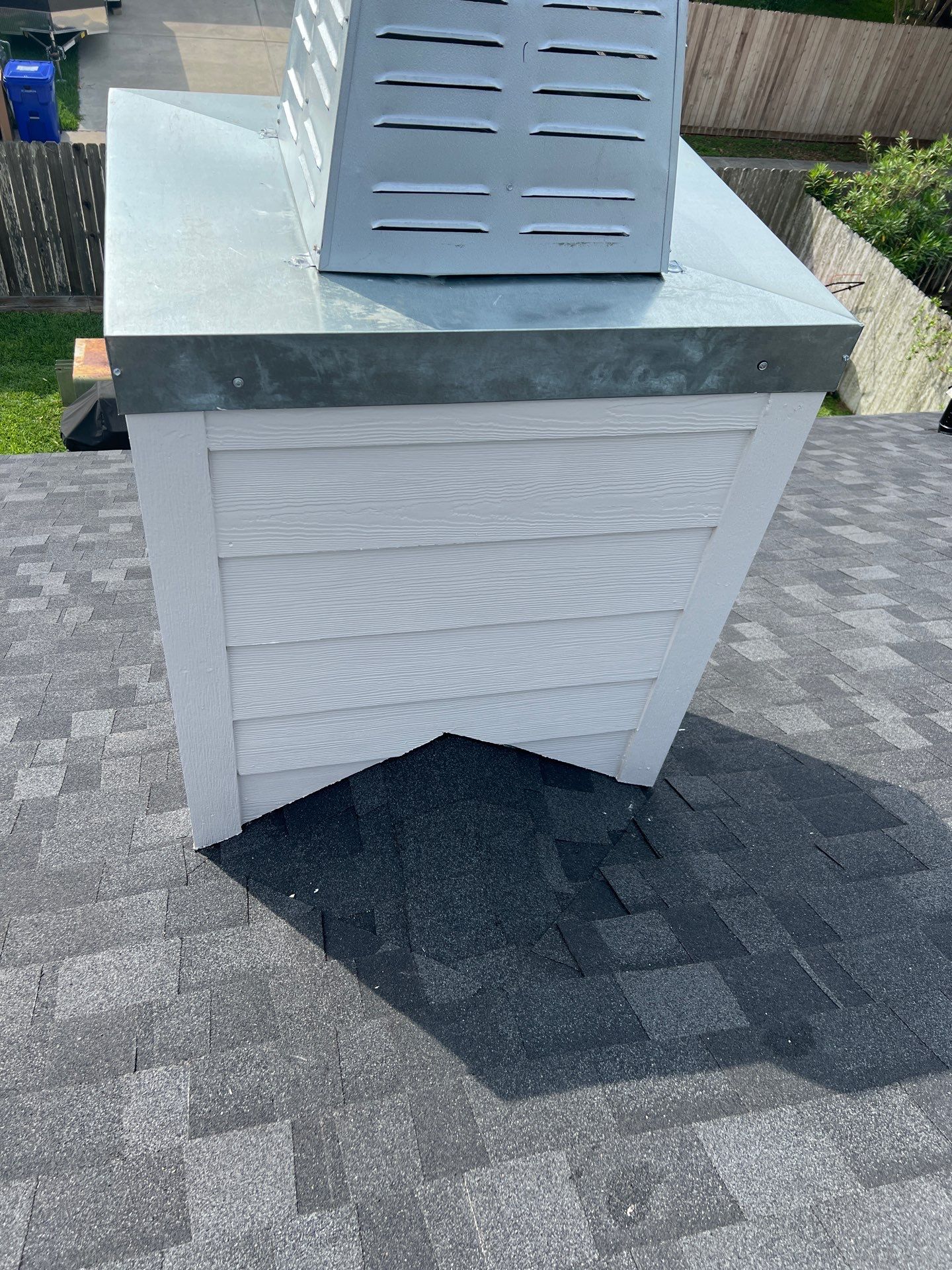 Nothing looks nicer than a little black roof by Bayfront Roofing and Construction