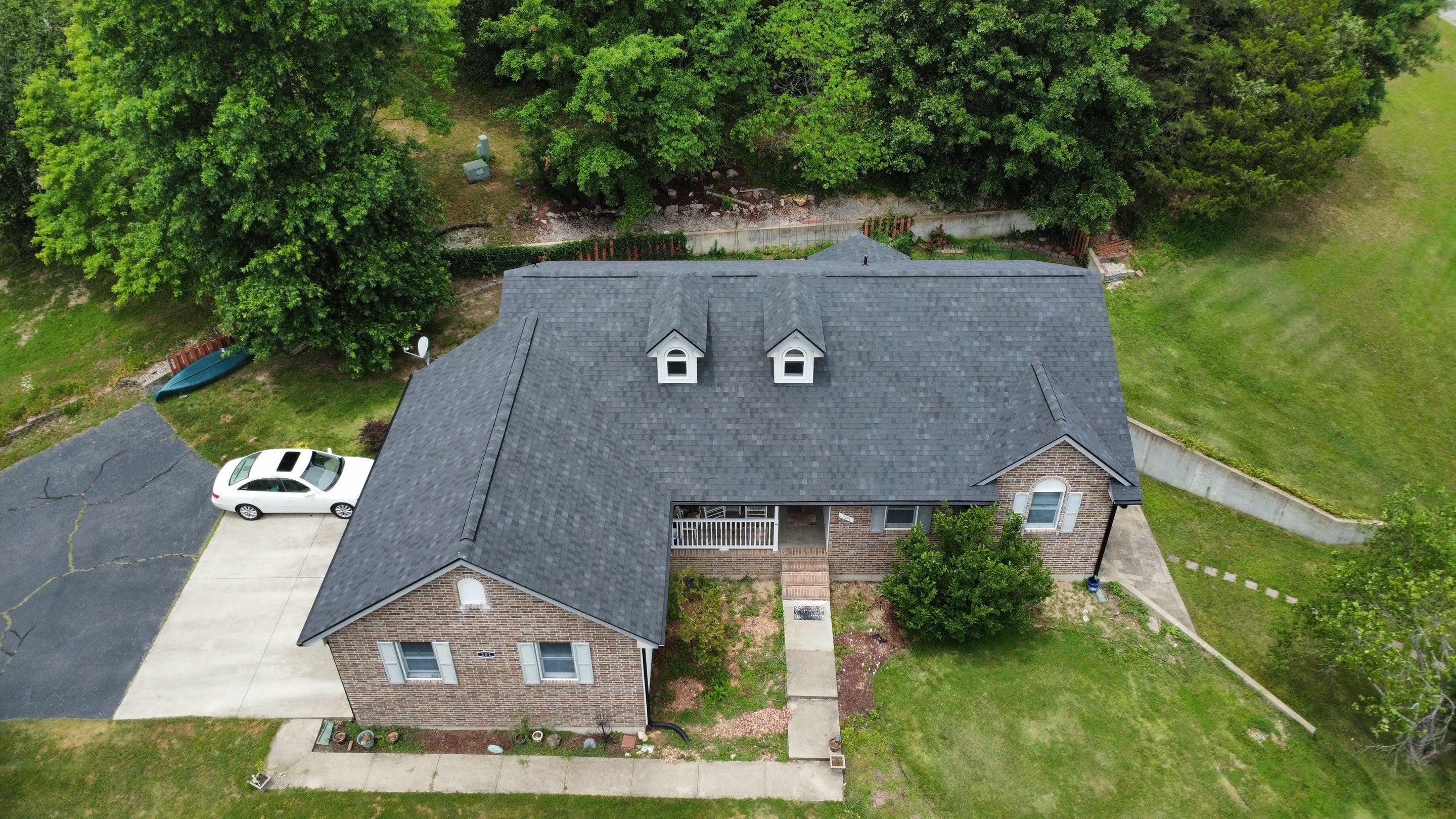 Residential Roof + Gutters & Downspouts & Gutter Guards Install  by Titan Commercial & Residential Roofing 