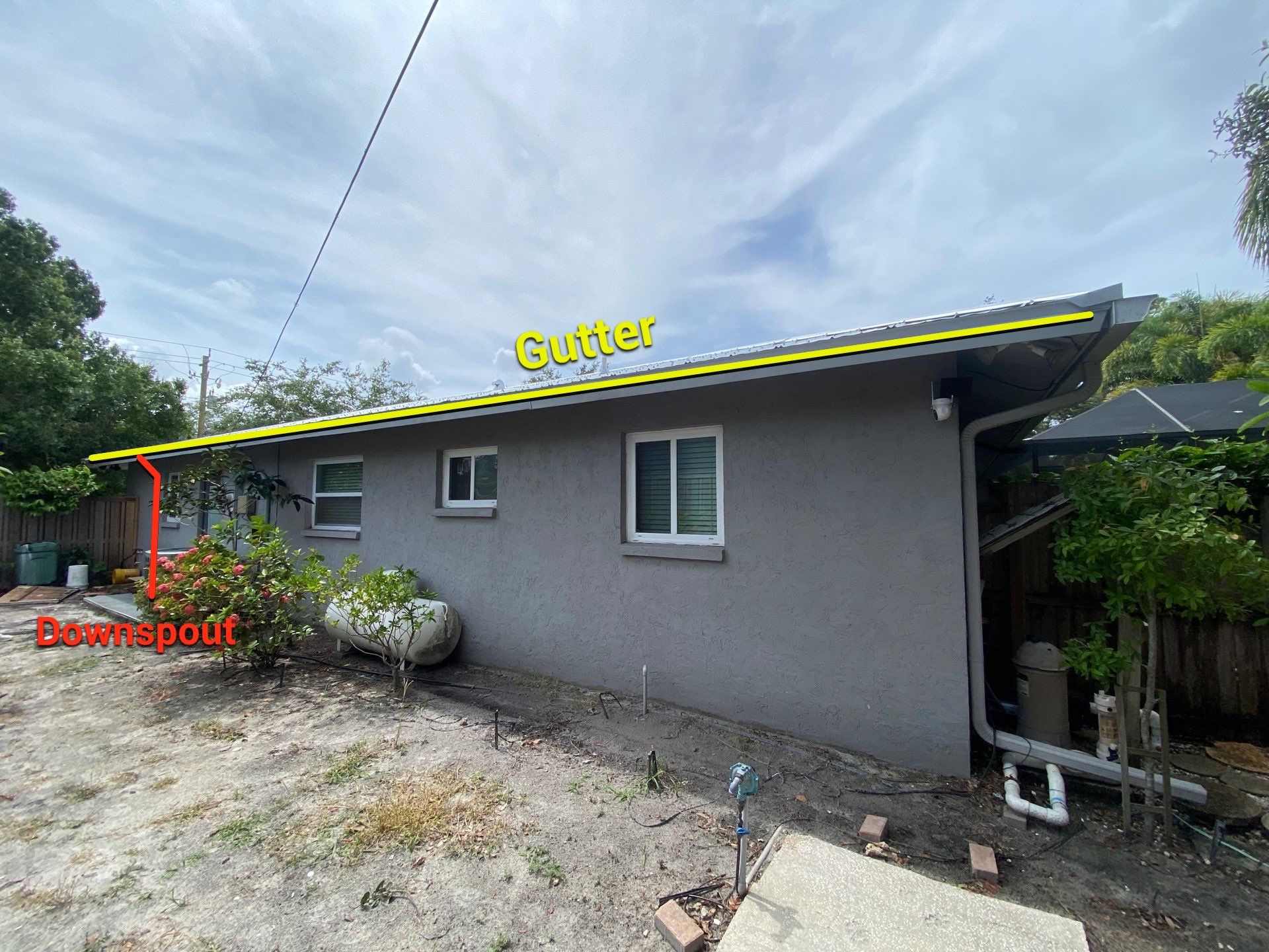 Aluminum Seamless Gutters using White Seamless Gutters in Sarasota FL by Gutter Professors