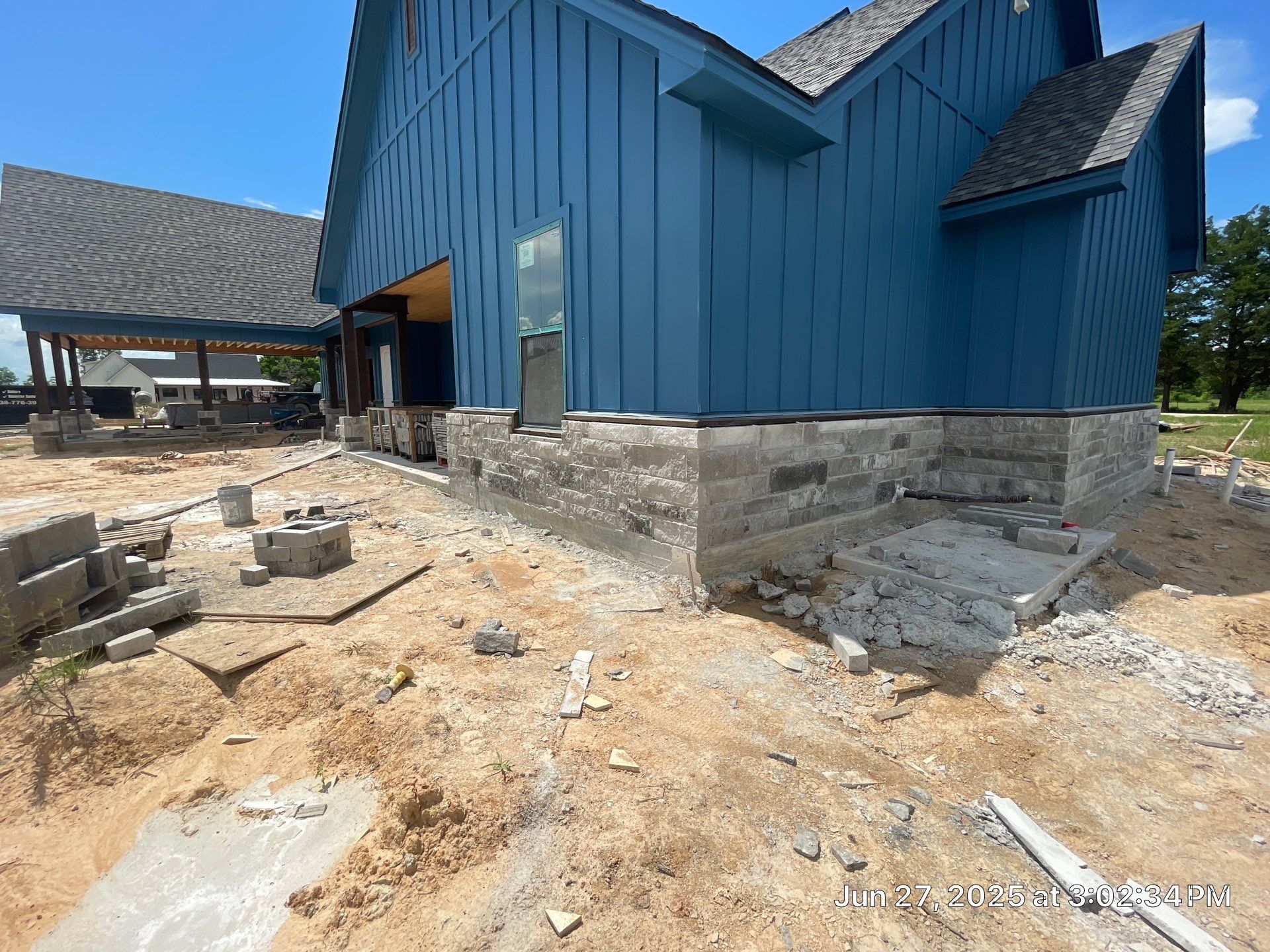 Natural Stone Elegance: Apex Installation Accented by Blue Siding by Apex Conventional Stucco Llc