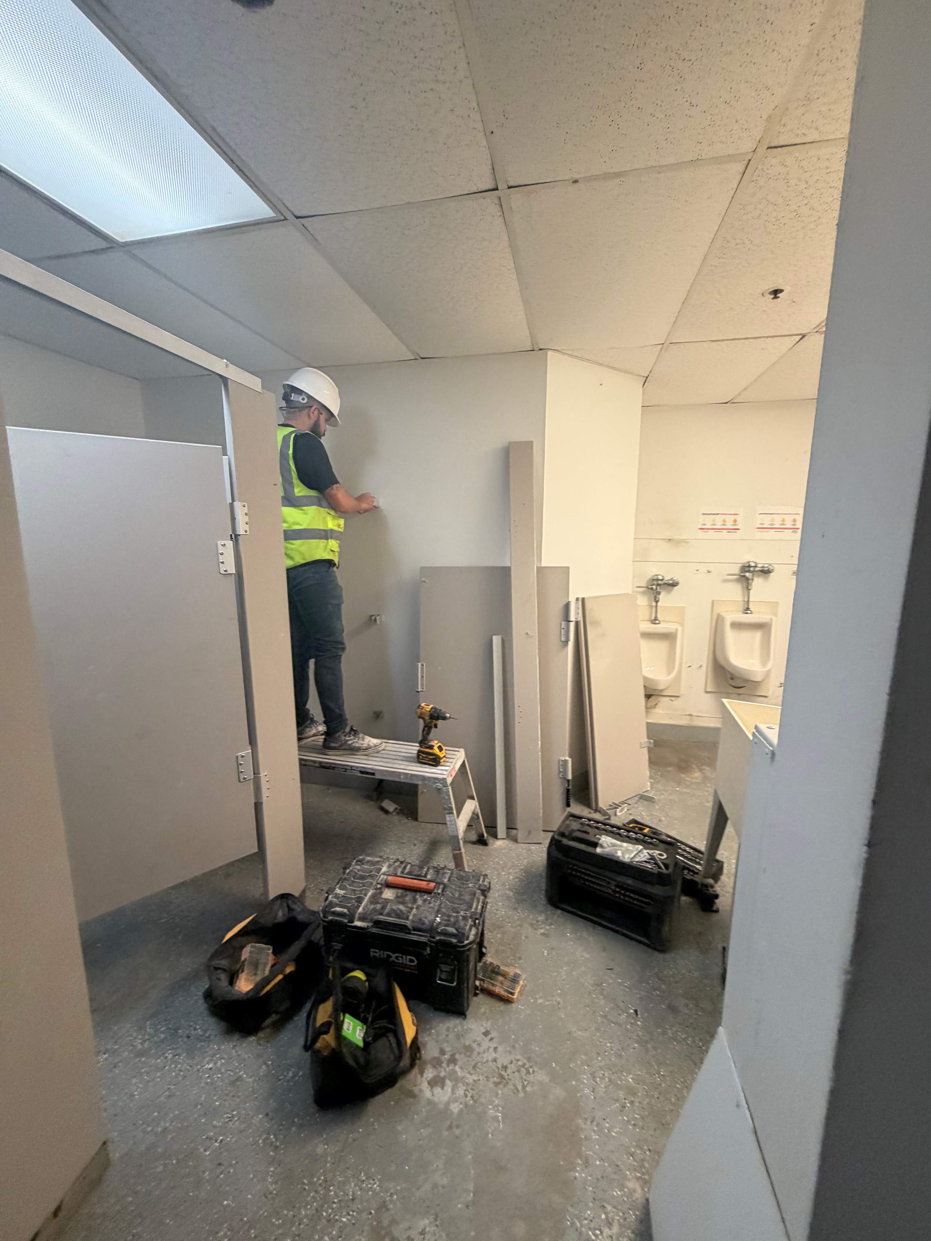 Commercial Restroom Renovation with Epoxy Flooring in Sarasota by Vertical General Contracting 