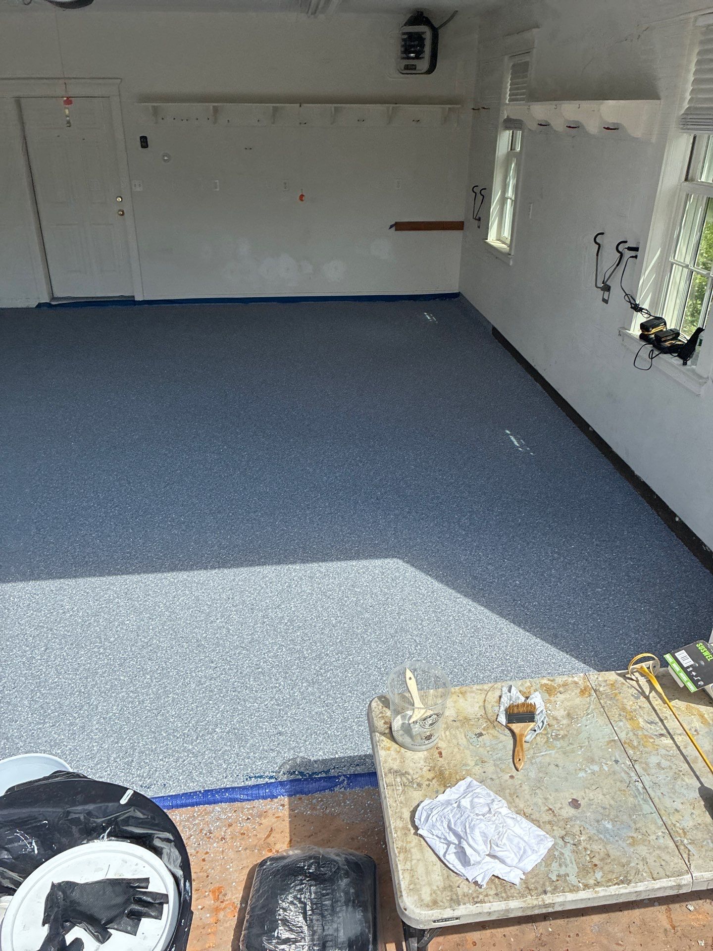 Basalt Concrete Floor Coating Transformation by DiGiorgi Roofing and Siding Inc