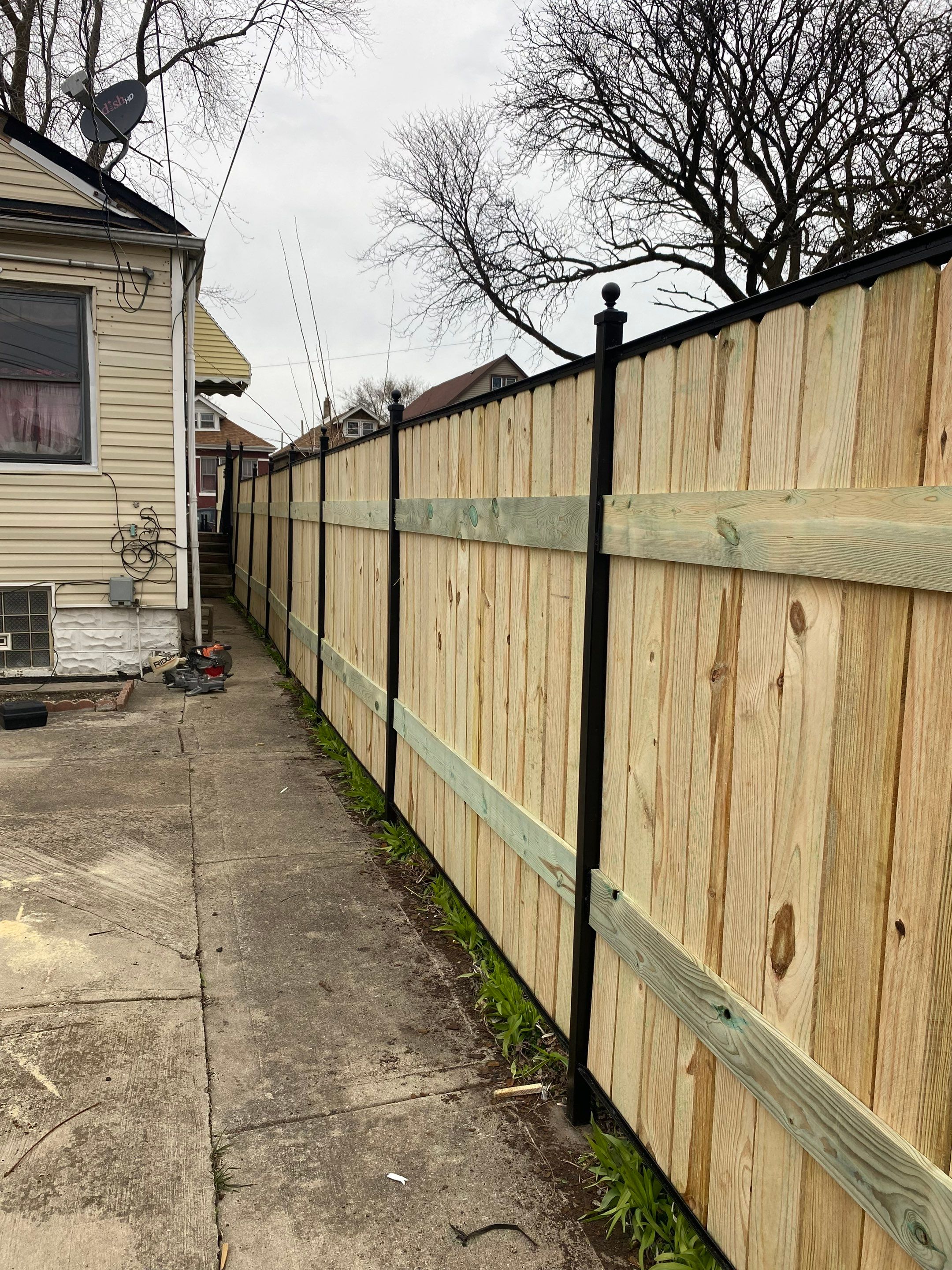 Fence Installation using pressure treated lumber  by INQUSE GENERAL CONTRACTOR