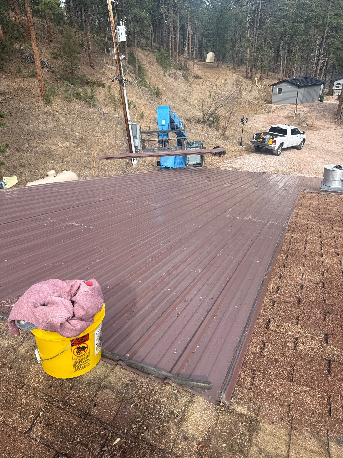 Residential Roofing Installation using Steel Roofing by Weather-Tite Exteriors LLC