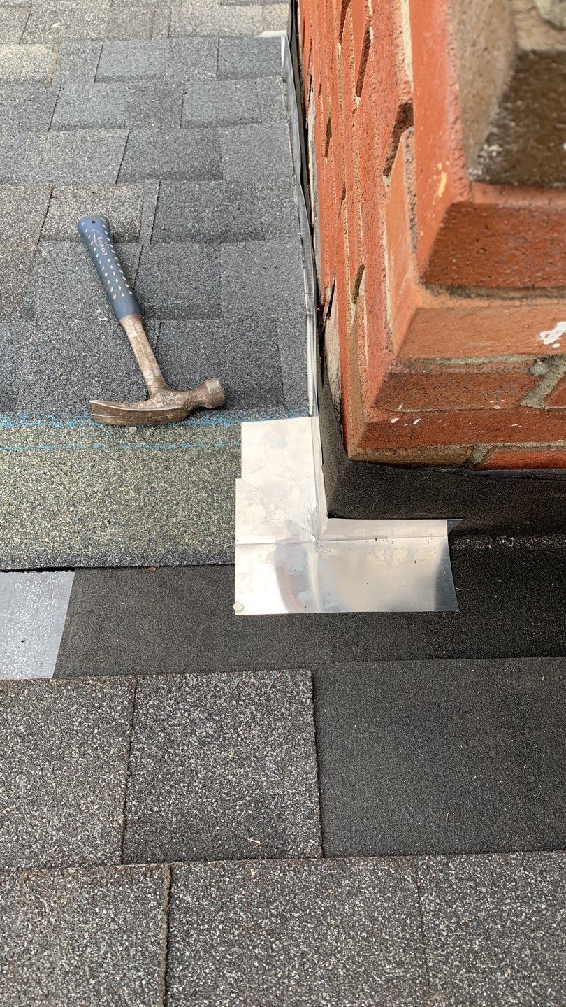 Residential Roofing Repair using Chimney Flashing by A Plus Exterior