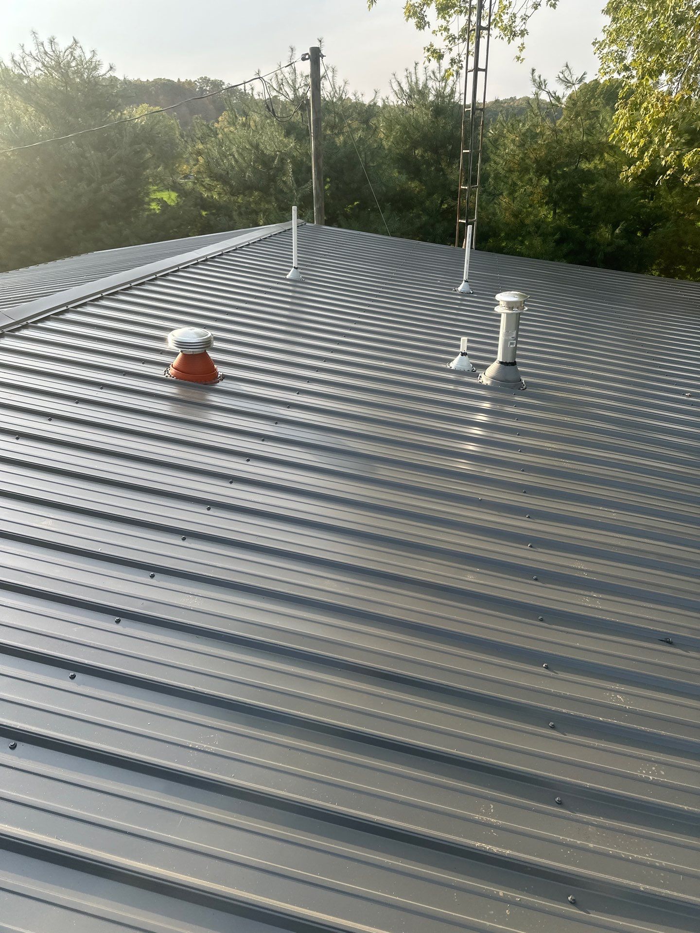 Residential Roofing Installation using Metal by Rainstoppers Roofing