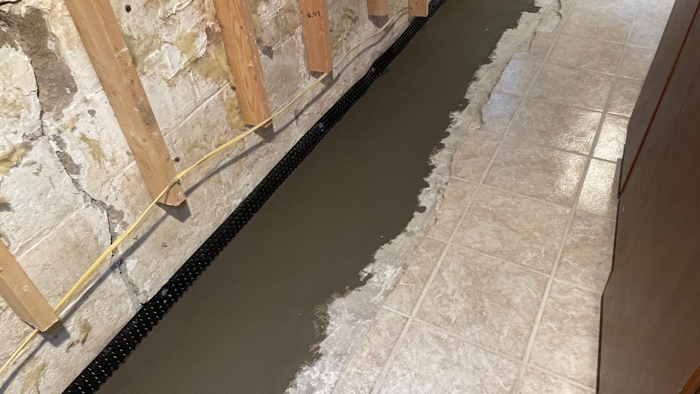 Drain Tile in Minneapolis for Kristen & Taylor by Waterproofing Northeast