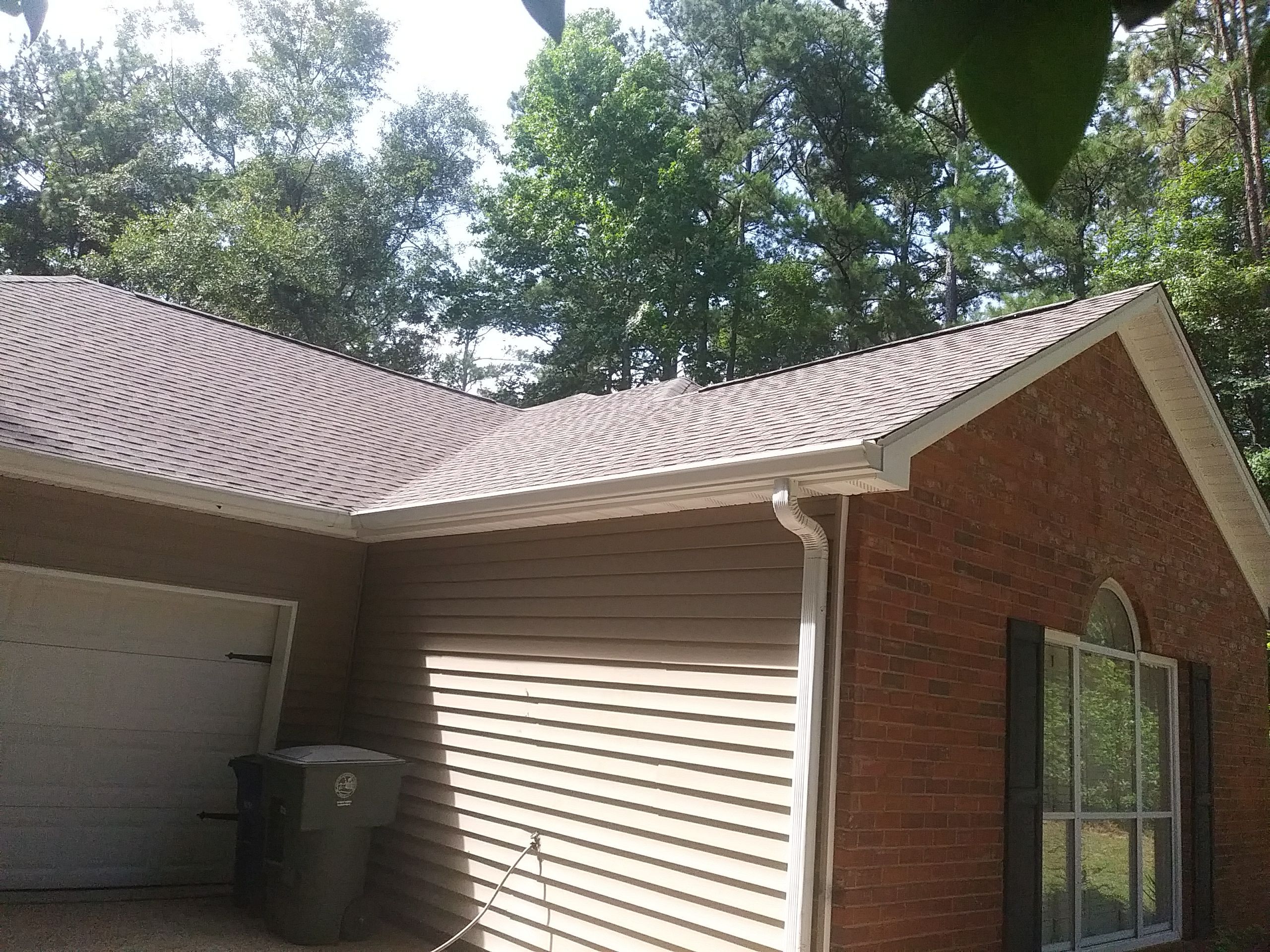 Residential Roofing Installation using Roof Replacement by American Roofing & Construction LLC