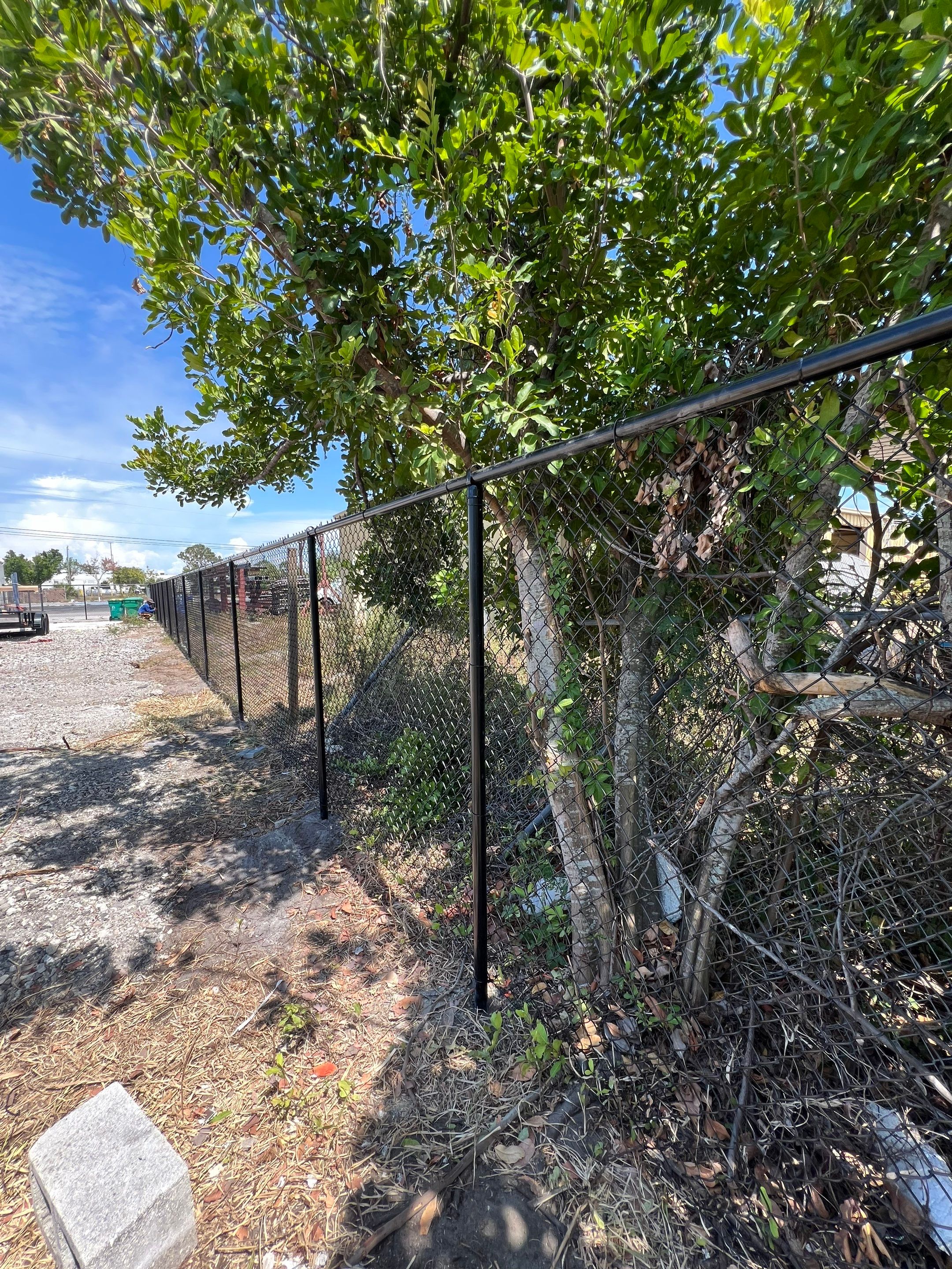 Chain-link Fence Installation using 6ft Black Chain Link Fence  by Asap fence and gates, LLC