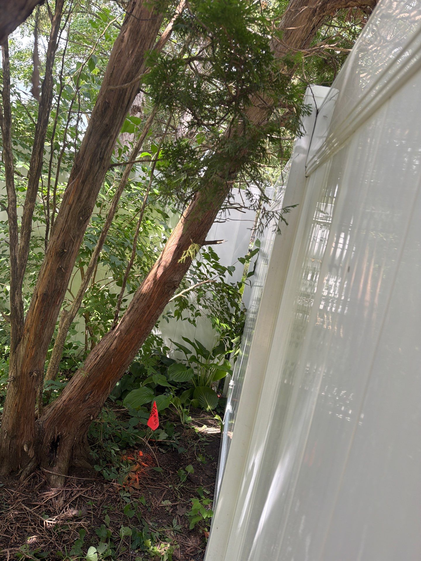 Residential White Vinyl Privacy and Black Chain Link Fencing in Jesup by Perfect Picket Fence and Stain