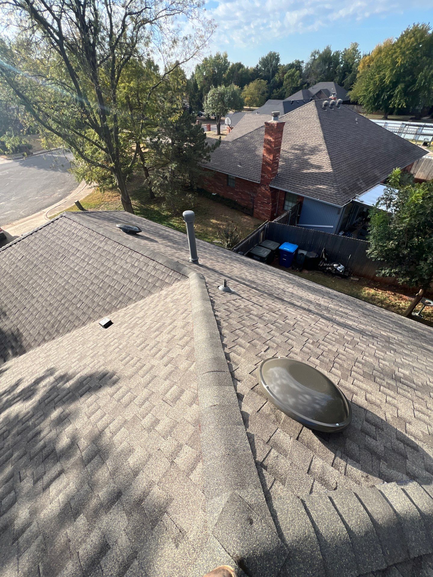Roof Replacement and Sun Tunnel Installation in Edmond, OK by McCann's Roofing and Construction