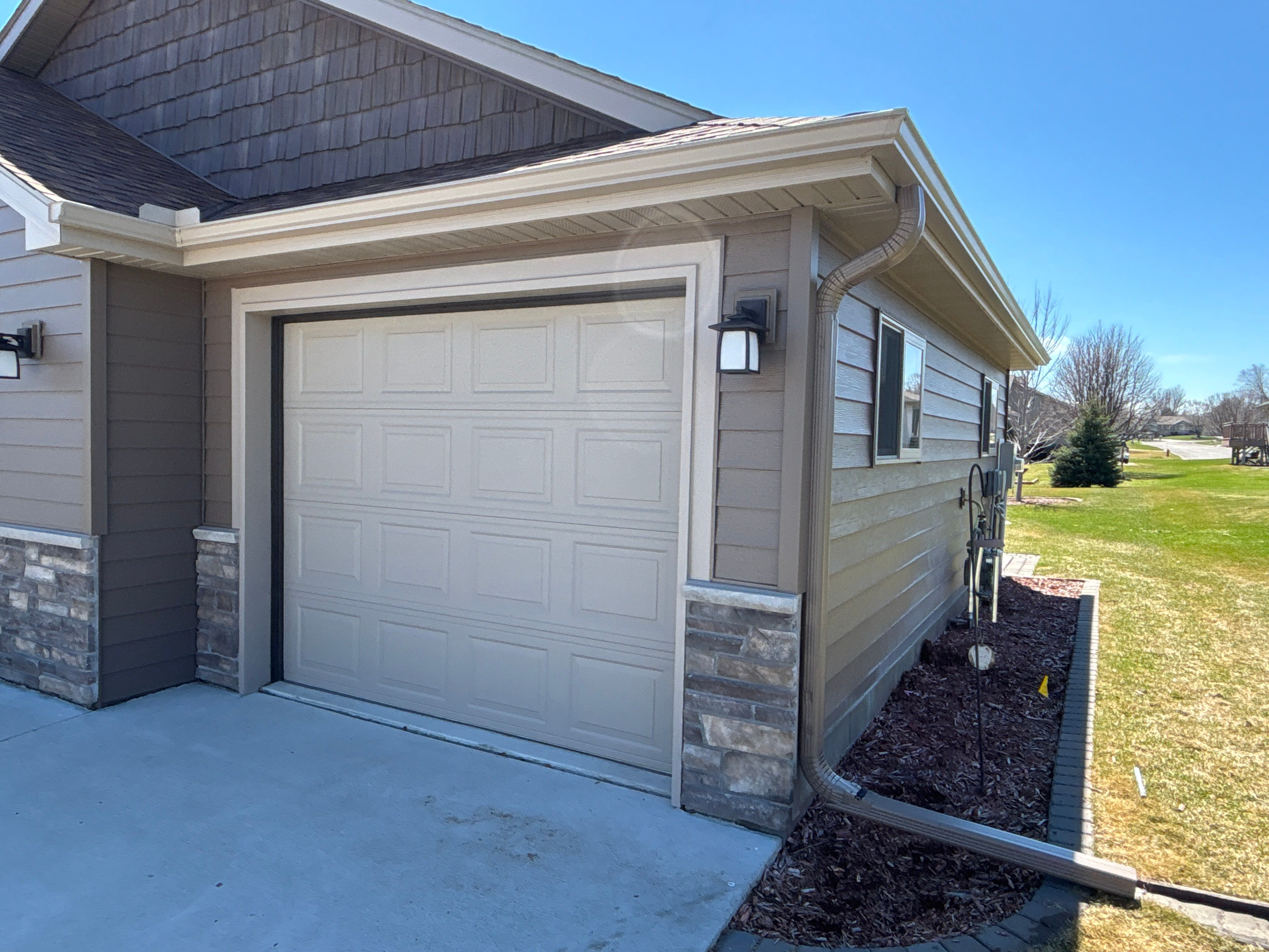 Seamless Gutter Installation in Melrose MN | 5” Sandstone Gutters by Next Level Seamless Gutters / Exteriors Inc.