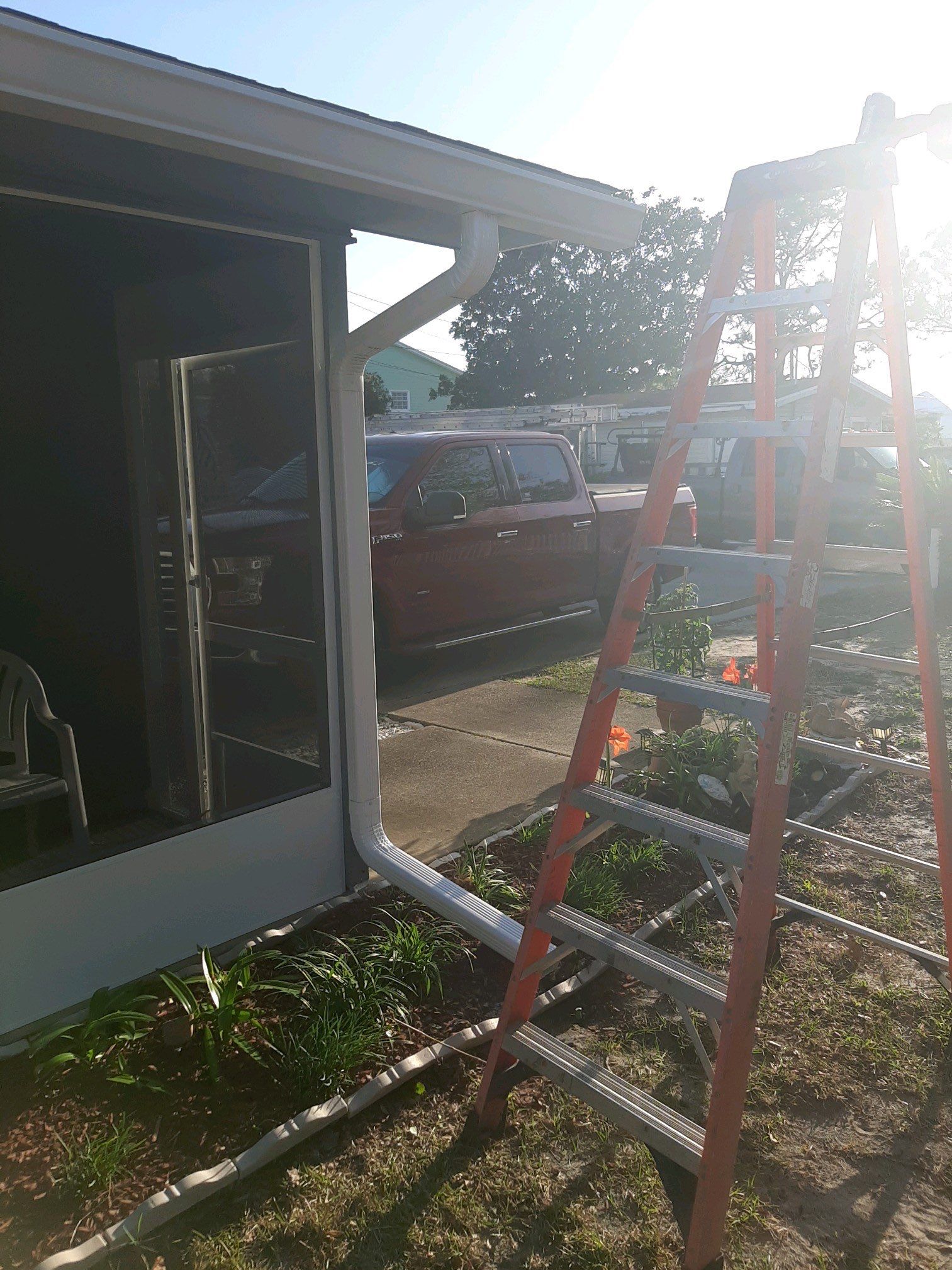 Seamless Gutter Installation Using White K-Style Gutters  by Gutter Professors